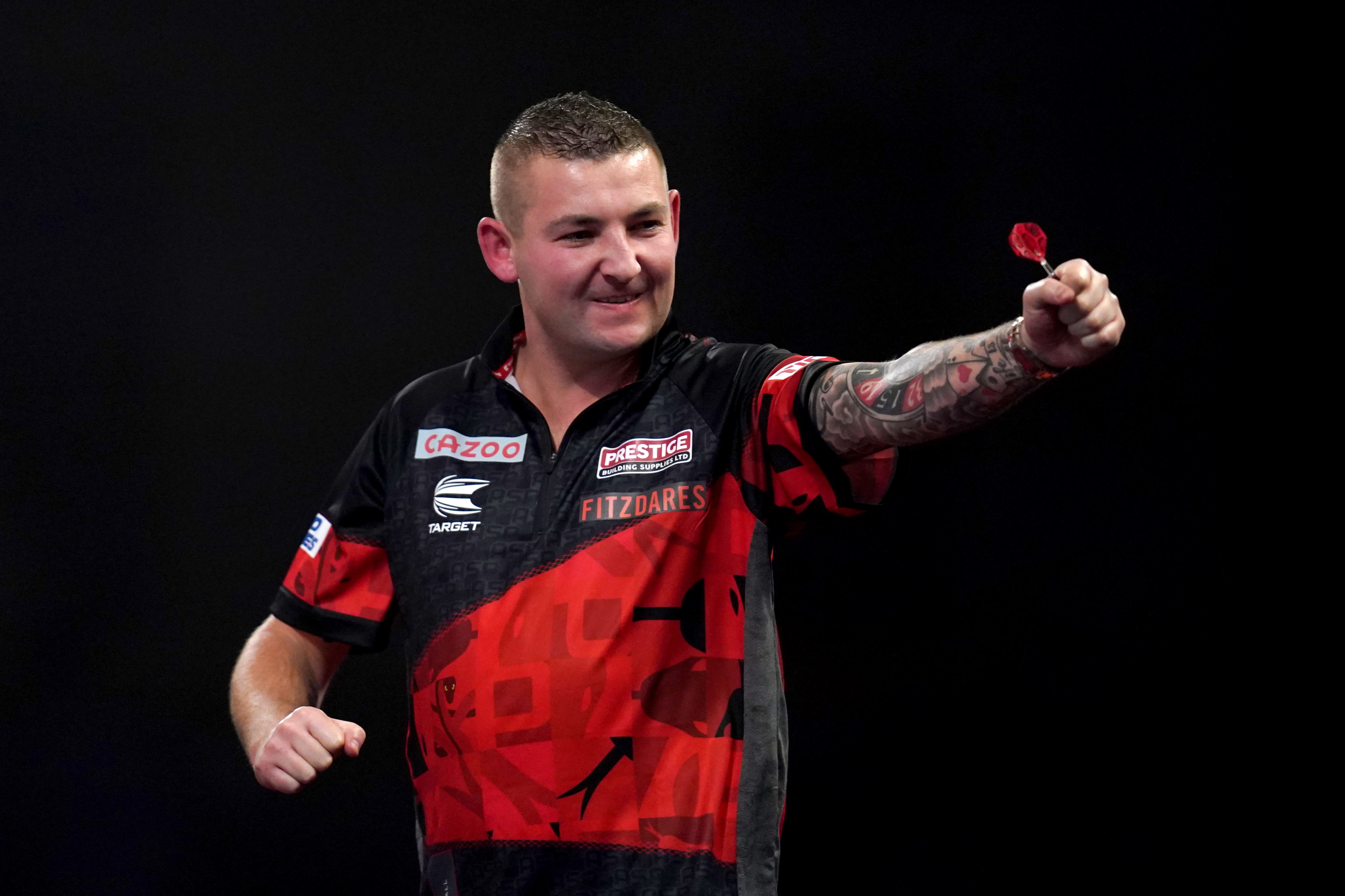 Nathan Aspinall brushed aside Jonny Clayton to win the Betfred World Matchplay title in Blackpool (John Walton/PA)