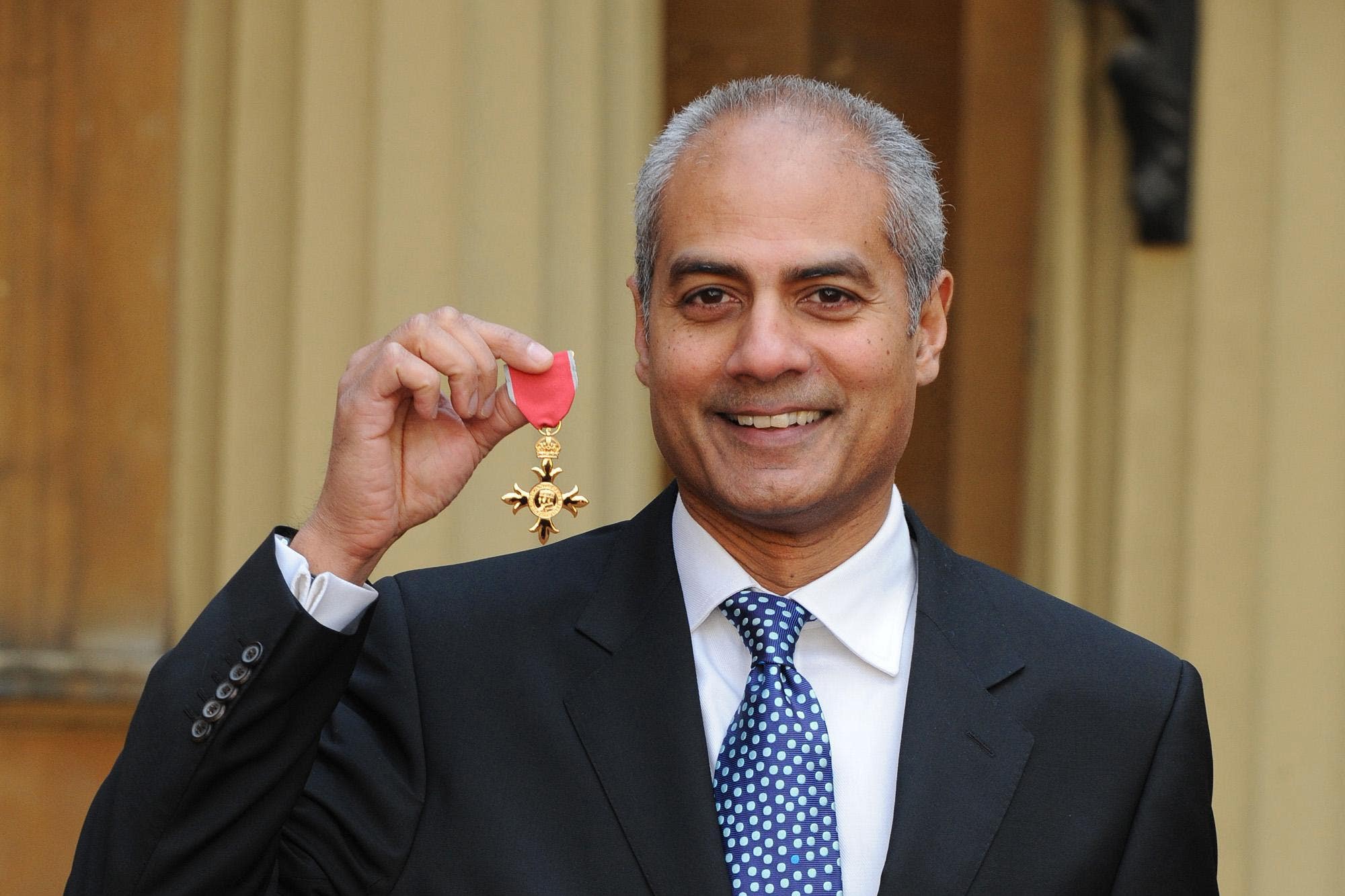 Posing with his OBE in 2008