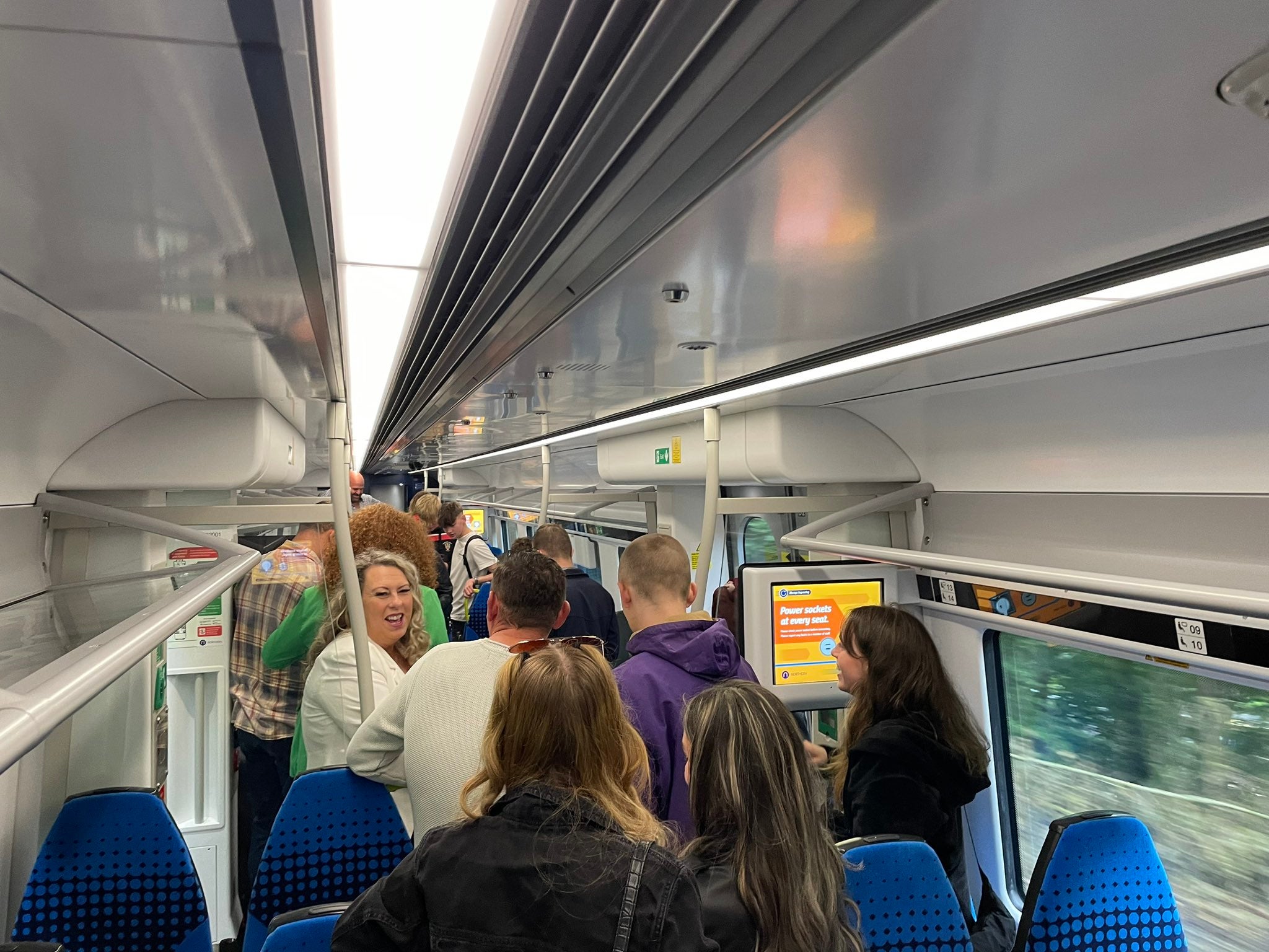 Everyone was up and out of their seats on the train from Shipley to Leeds when a snake was spotted slithering around