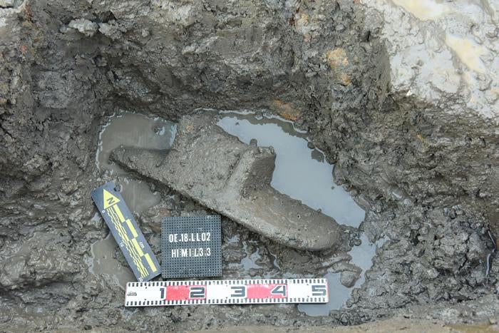 This footed sandstone grinding slab, 76 cm long by 31 cm wide, was excavated in 2018