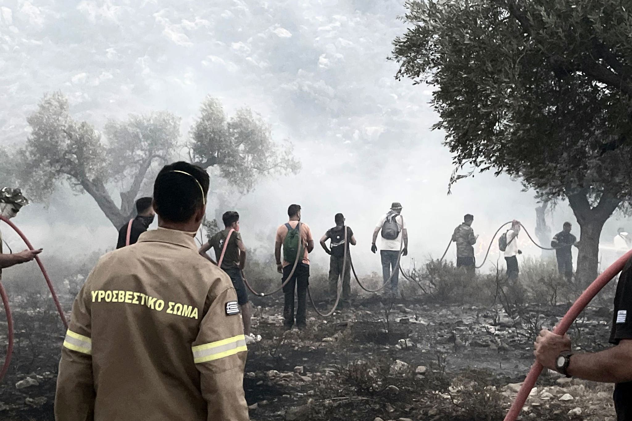 Emergency services trying to put out wildfires on Rhodes (Sarah George/PA)