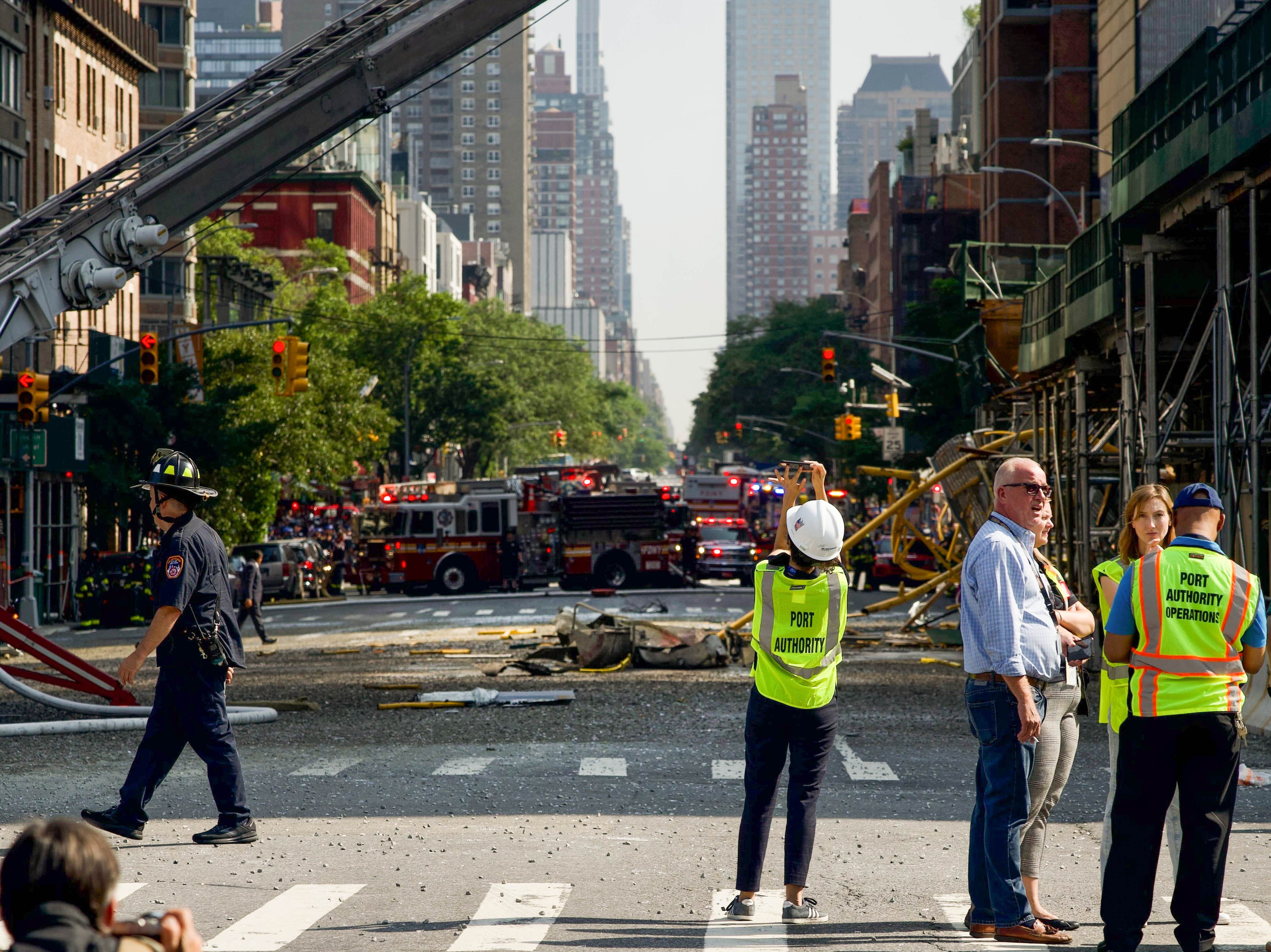 Debris from the construction crane that collapsed in Manhattan, New York lies on the street on 26 July