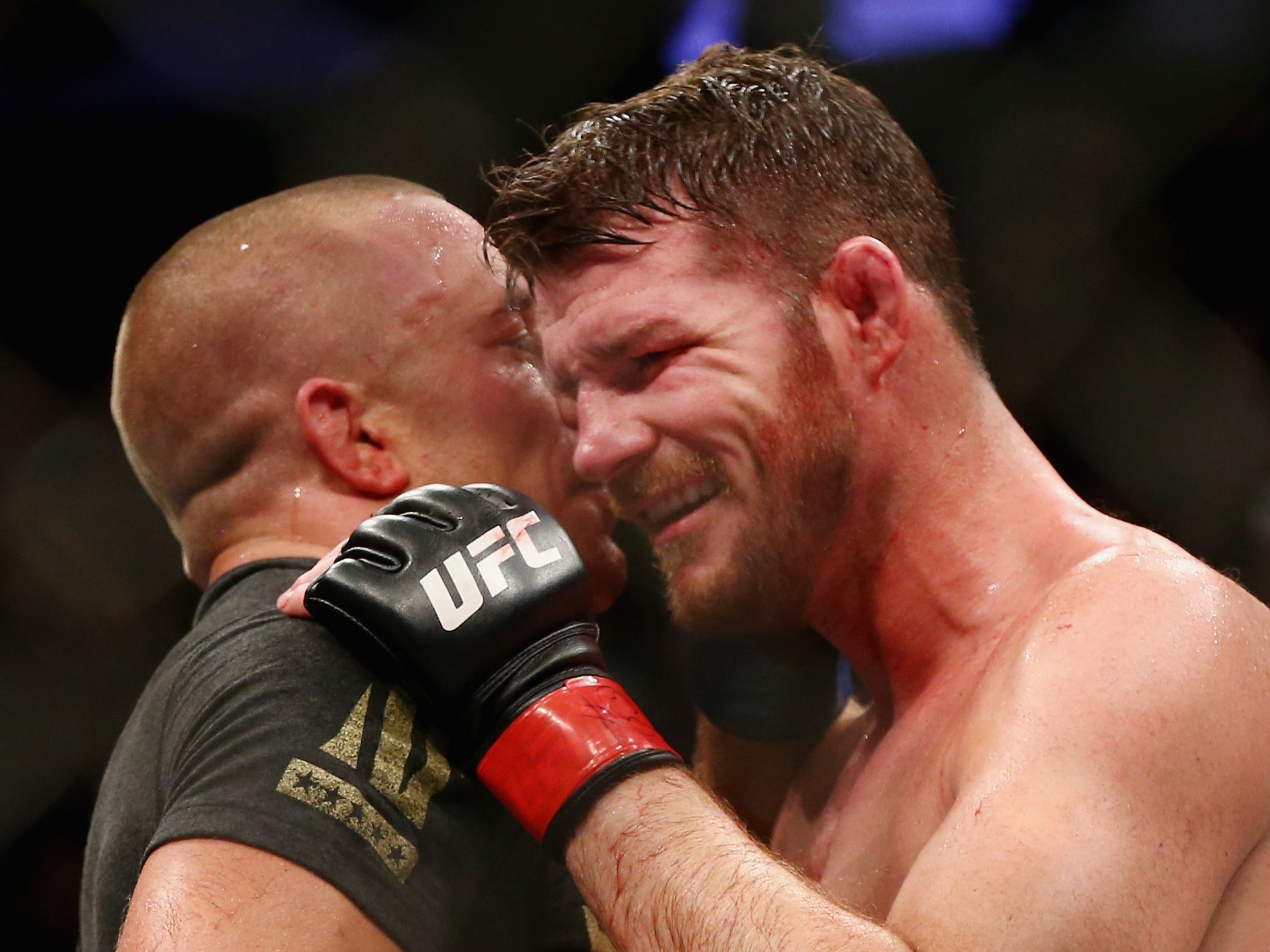 Bisping and Georges St-Pierre after their UFC title clash in 2017