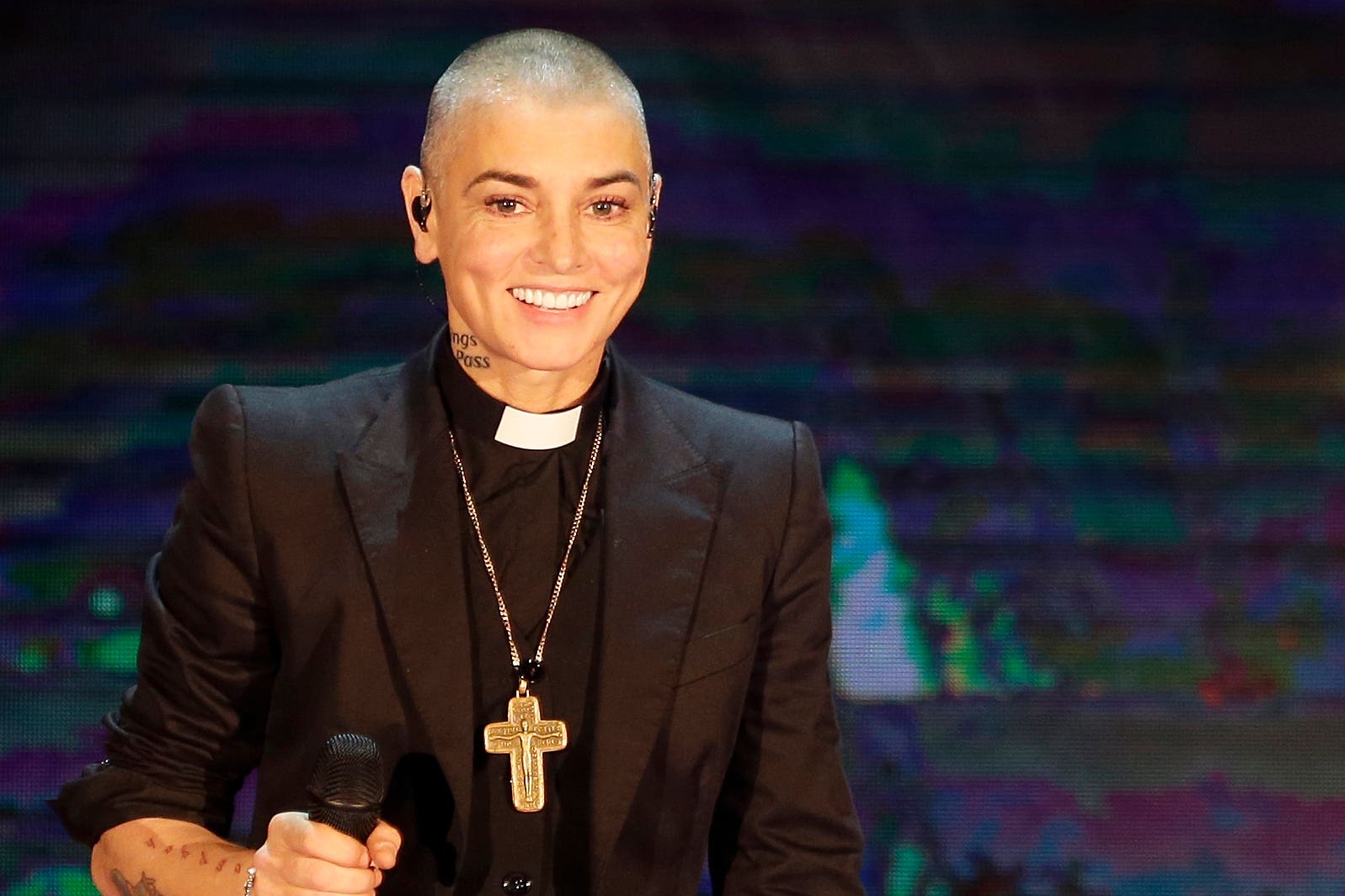 Irish singer Sinead O’Connor performs during the Italian State RAI TV programme in 2014 (Antonio Calanni/AP)