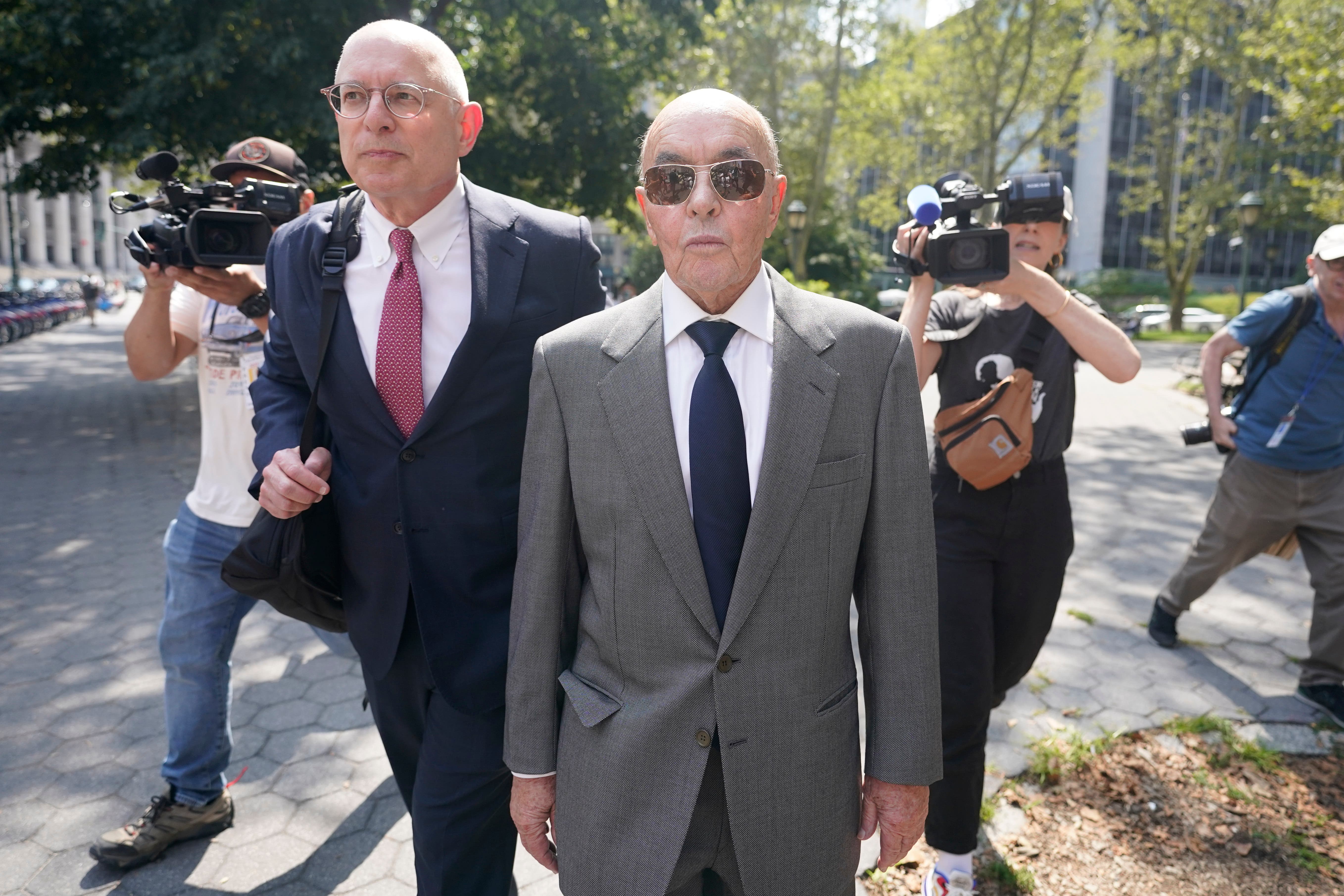 Tavistock founder Joe Lewis leaves court on Wednesday (Mary Altaffer/AP)