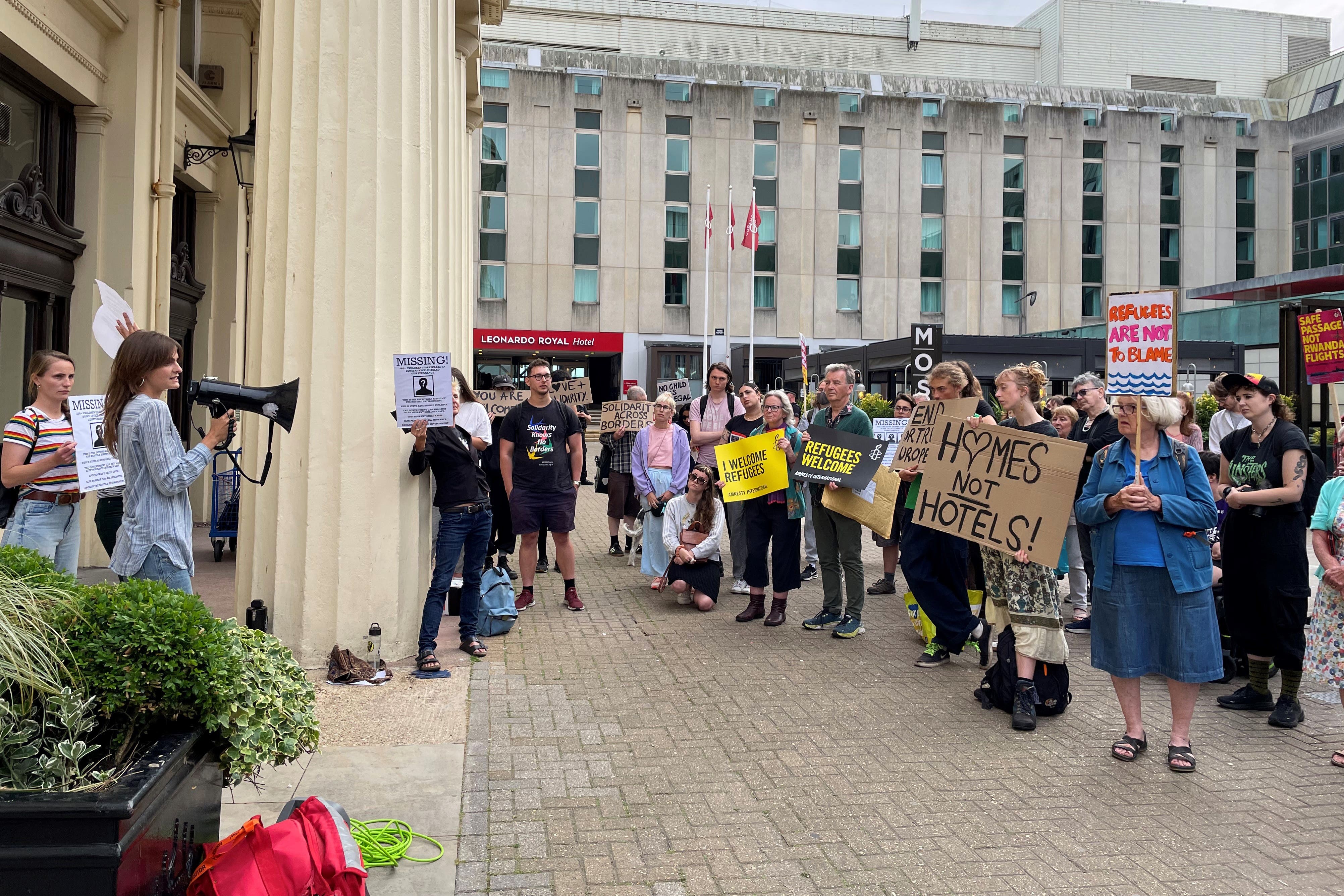 People gather outside Brighton Town Hall in June in support of Brighton and Hove City Council’s plan to launch legal action against the Home Office for reopening a hotel where more than 100 unaccompanied asylum-seeking children went missing (Anahita Hossein-Pour/PA)