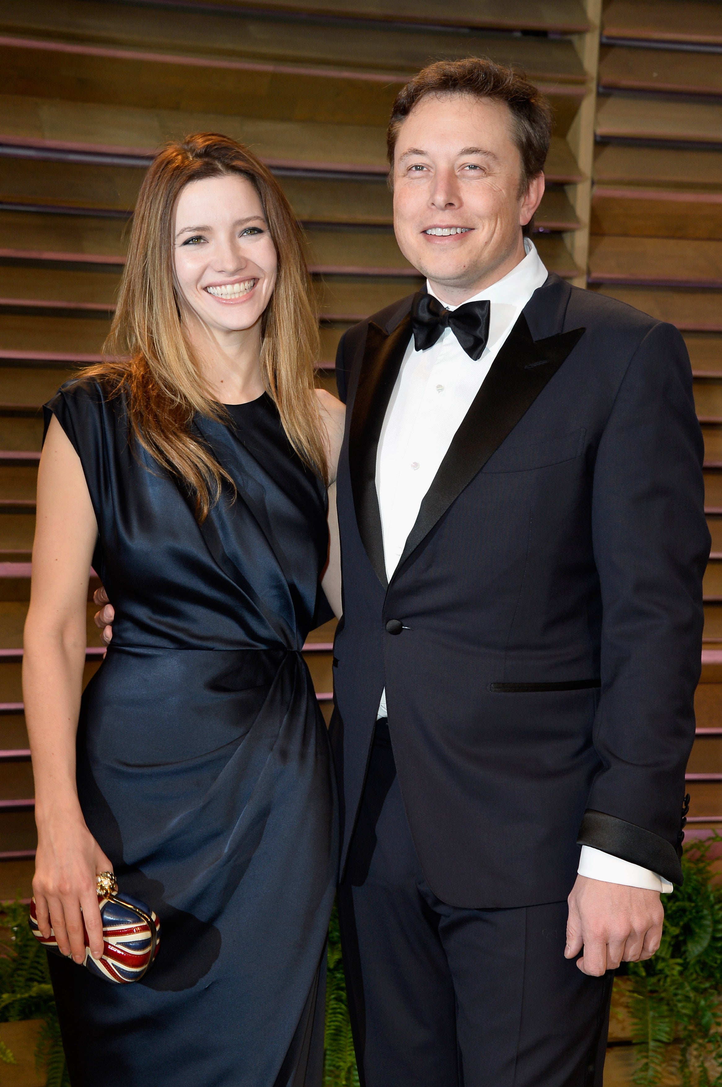 Talulah Riley (L) and CEO of Tesla Motors Elon Musk attend the 2014 Vanity Fair Oscar Party hosted by Graydon Carter on March 2, 2014