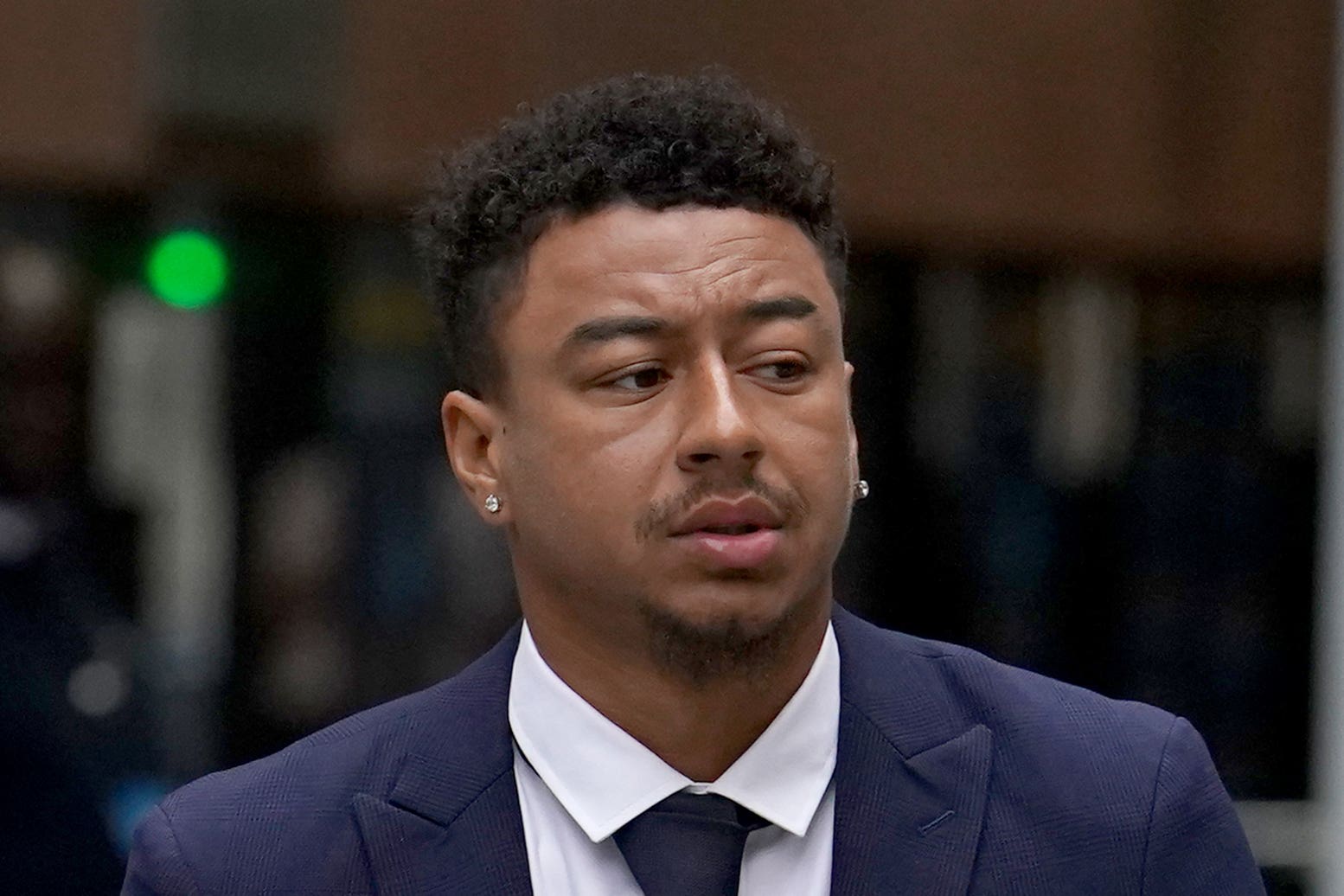 Former Manchester United footballer Jesse Lingard leaves Manchester Magistrates’ Court (Martin Rickett/PA)