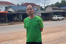 A rights lawyer who was fleeing China has been arrested in neighboring Laos