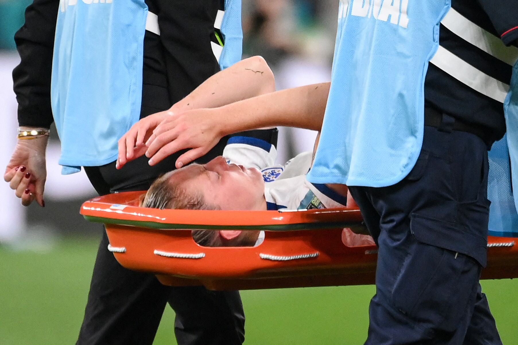 Walsh appeared to be in serious pain as she was stretchered off