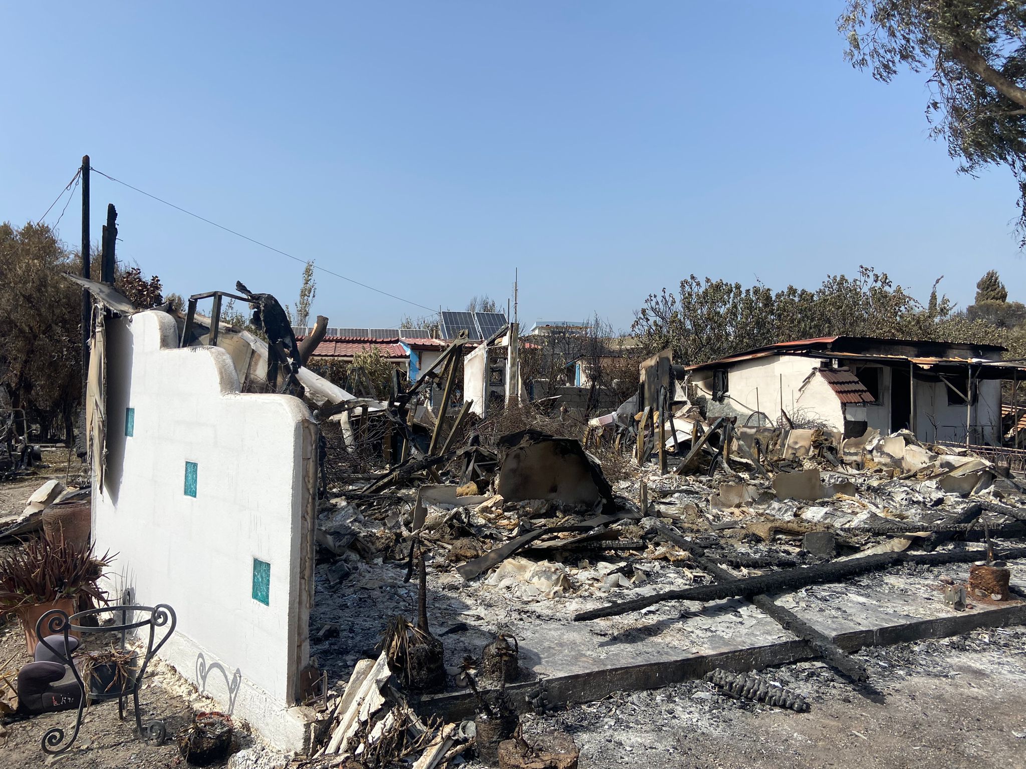 Wedding planner Nicole’s house is among several in Kiotari that have been reduced to rubble and ashes