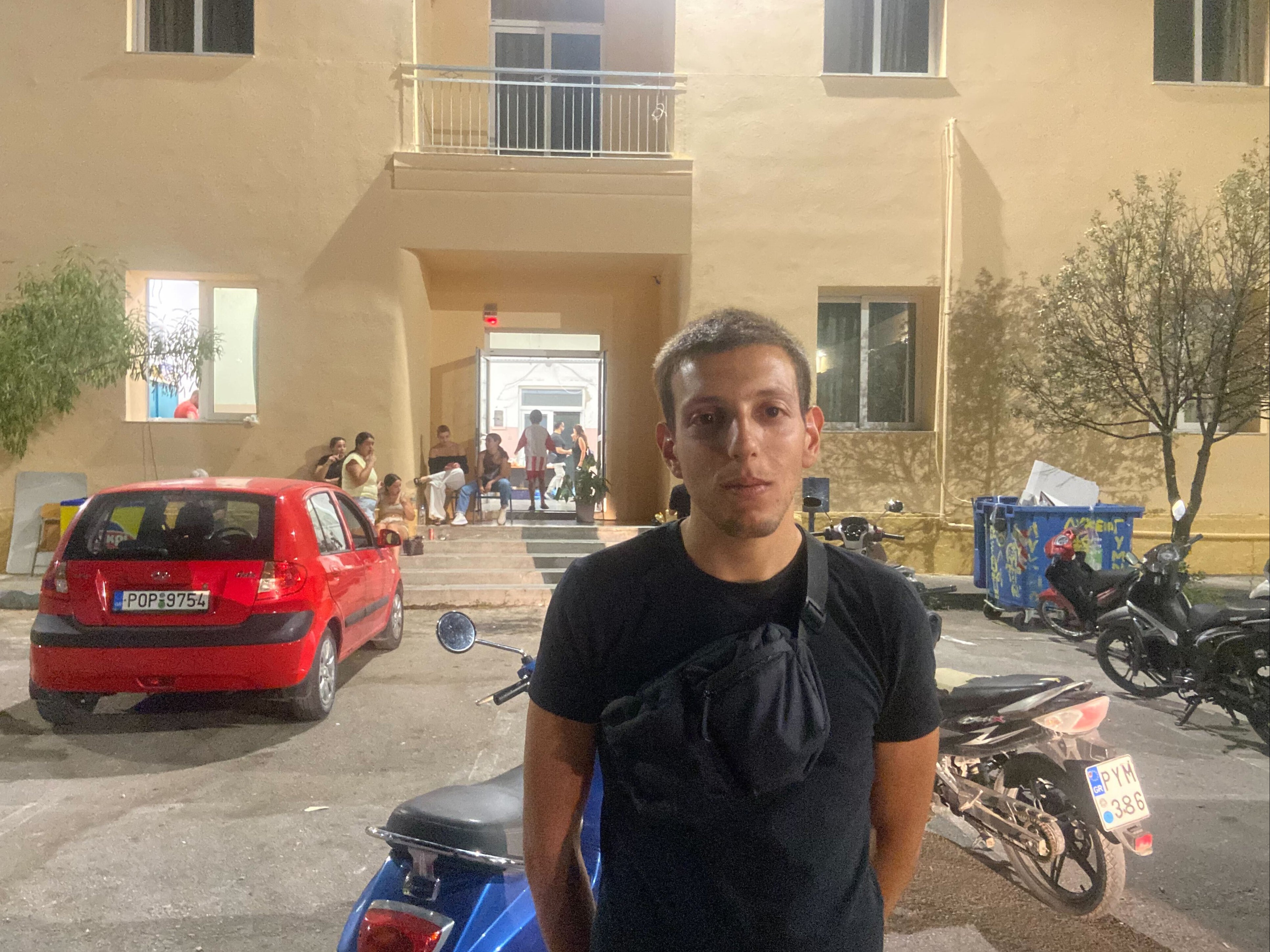 Antonis Chatzimichalis volunteering to help locals and tourists stranded by the fire