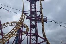 Riders suspended in air on 72-foot rollercoaster for 40 minutes
