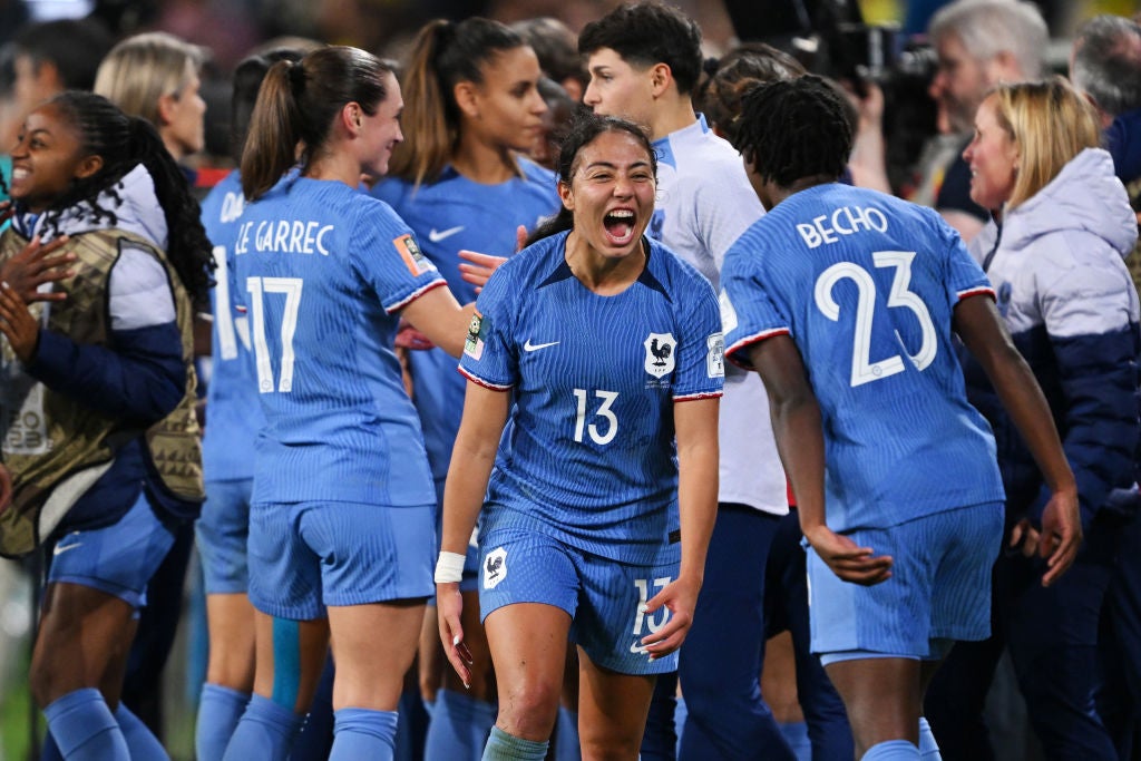 Selma Bacha and Vicki Becho of France celebrate beating Brazil