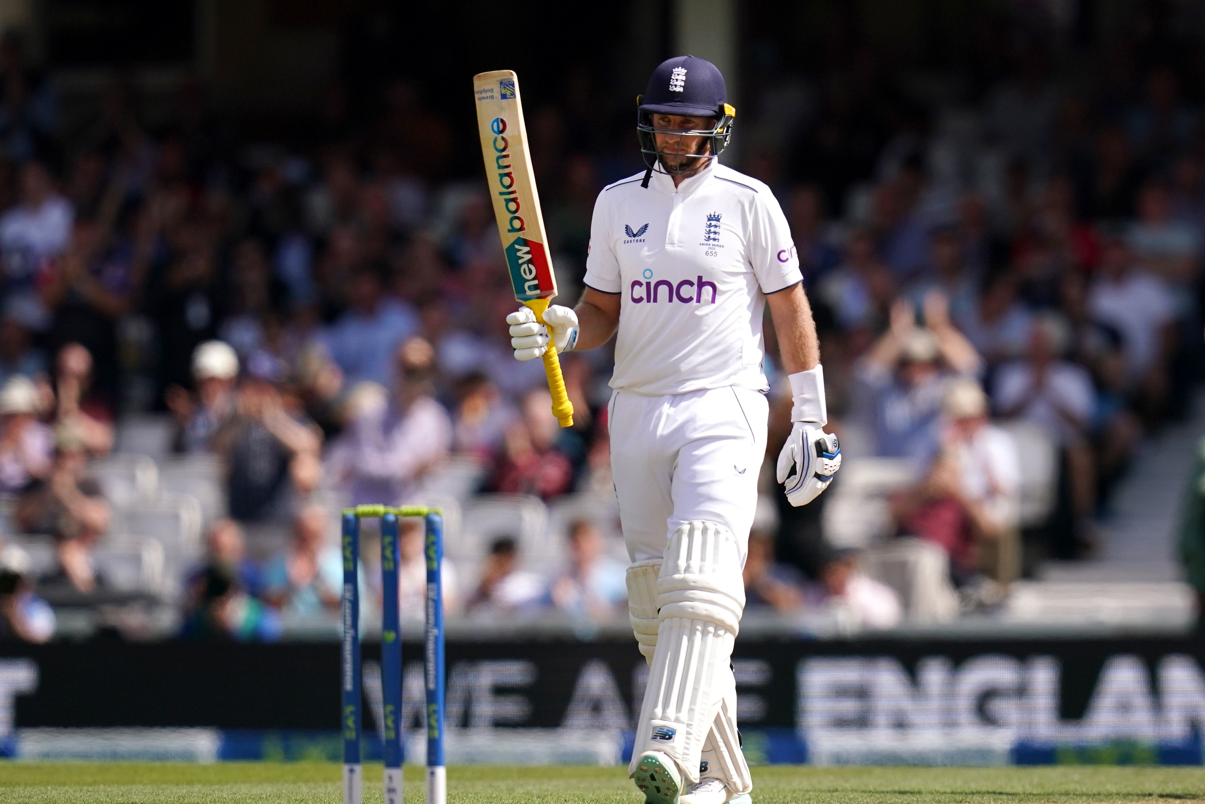 England’s Joe Root celebrates a half century on day three of the final Ashes Test at the Kia Oval (John Walton/PA)