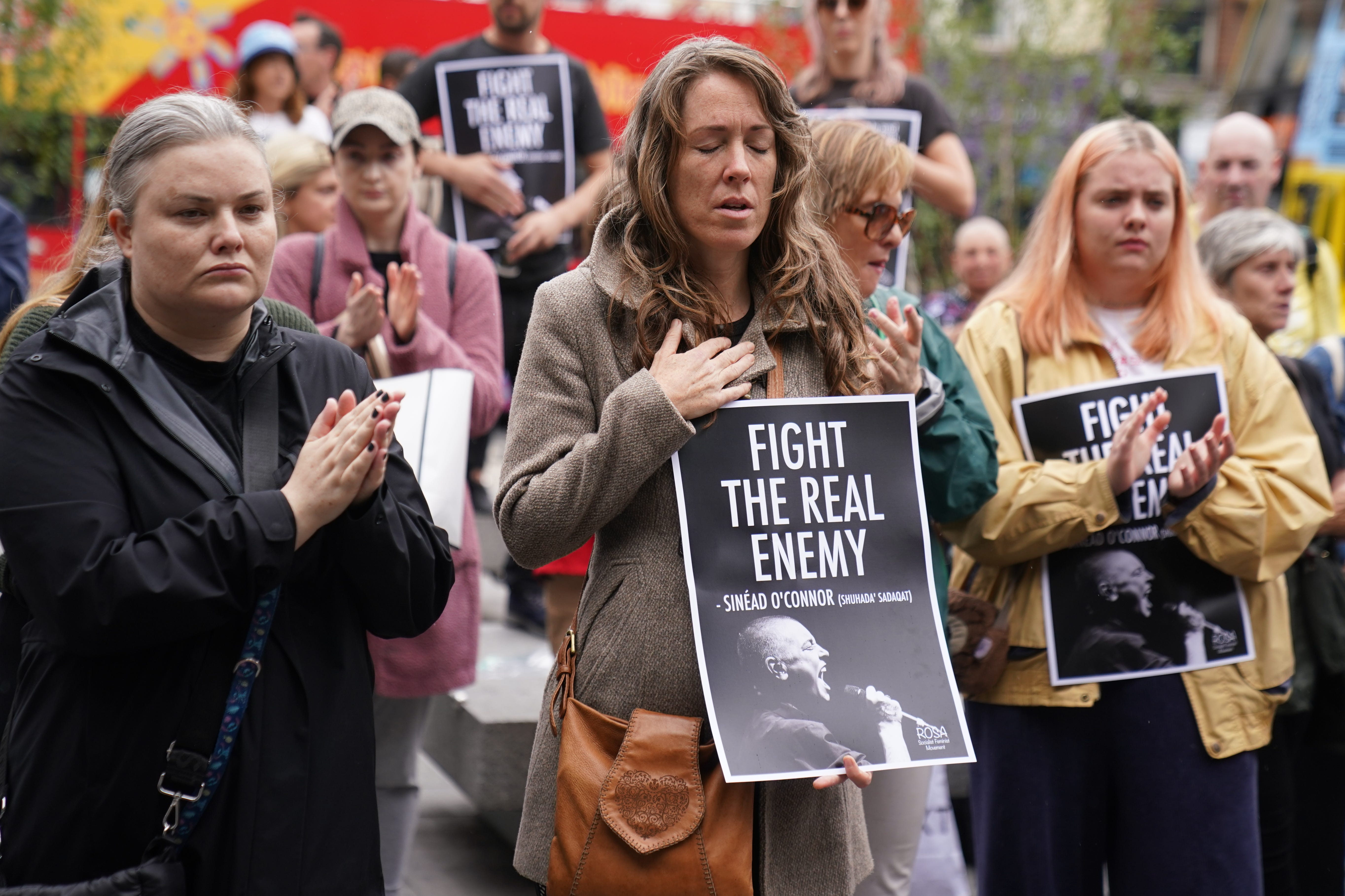 Fans at Barnardo Square sing in memory of Sinead O’Connor, who died aged 56 (Brian Lawless/PA)