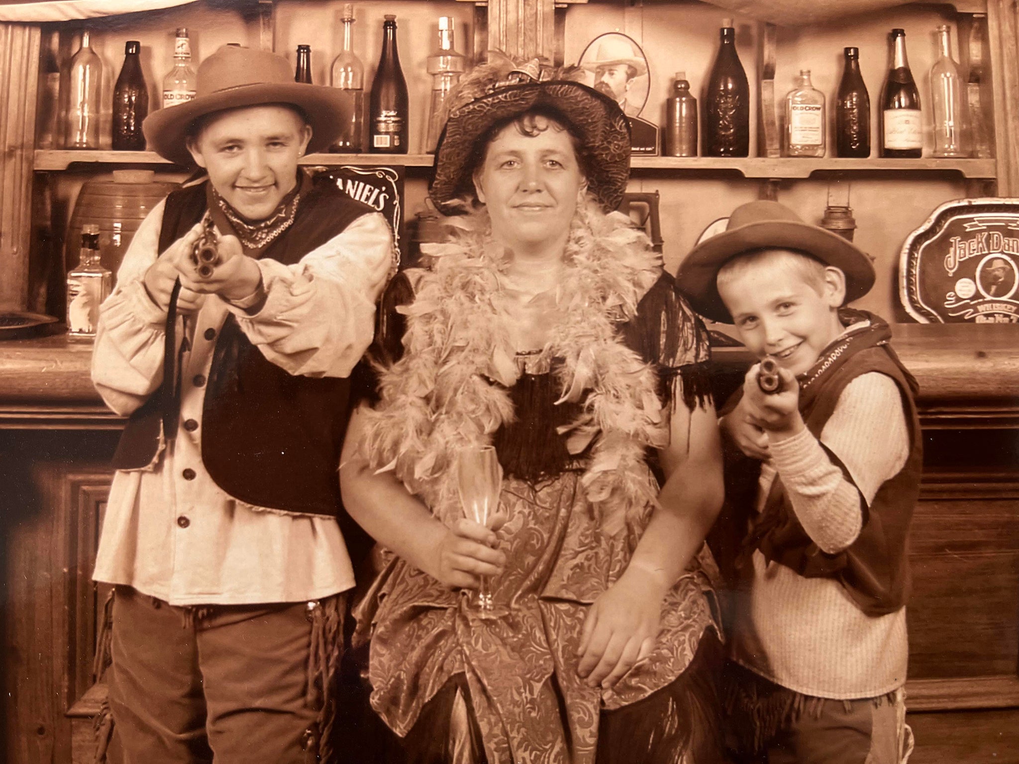 Nicholas (left) at Chessington aged 10 with mum Emma and brother Sebastian