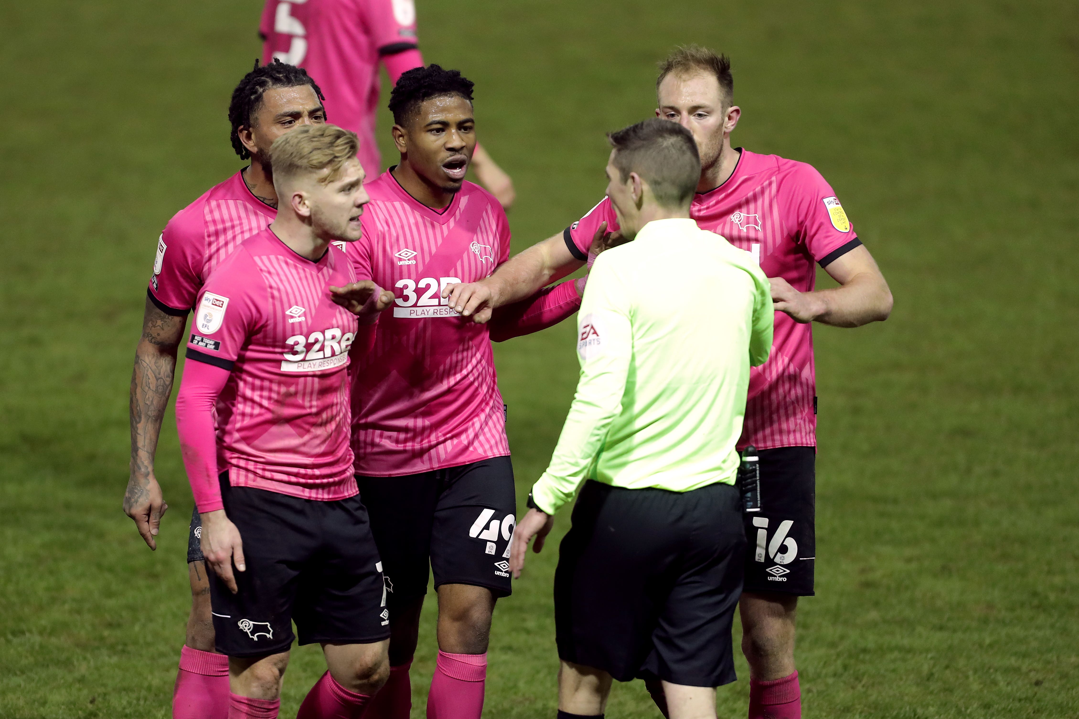 Referees have been instructed to issue at least one card where they are confronted by two or more players (Richard Sellers/PA)