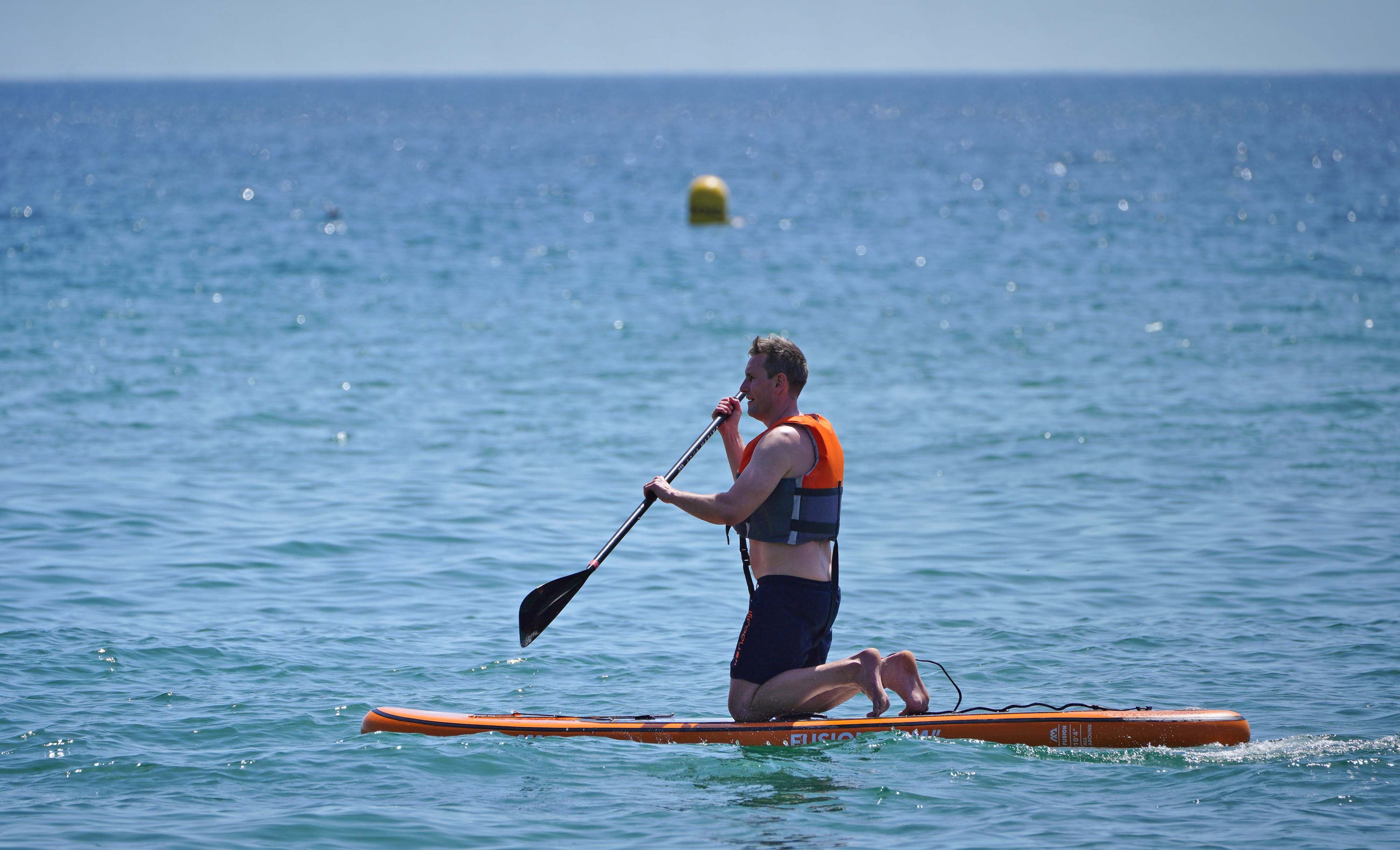 The RNLI and British Canoeing are urging people to prioritise their safety before taking a dip across UK shores