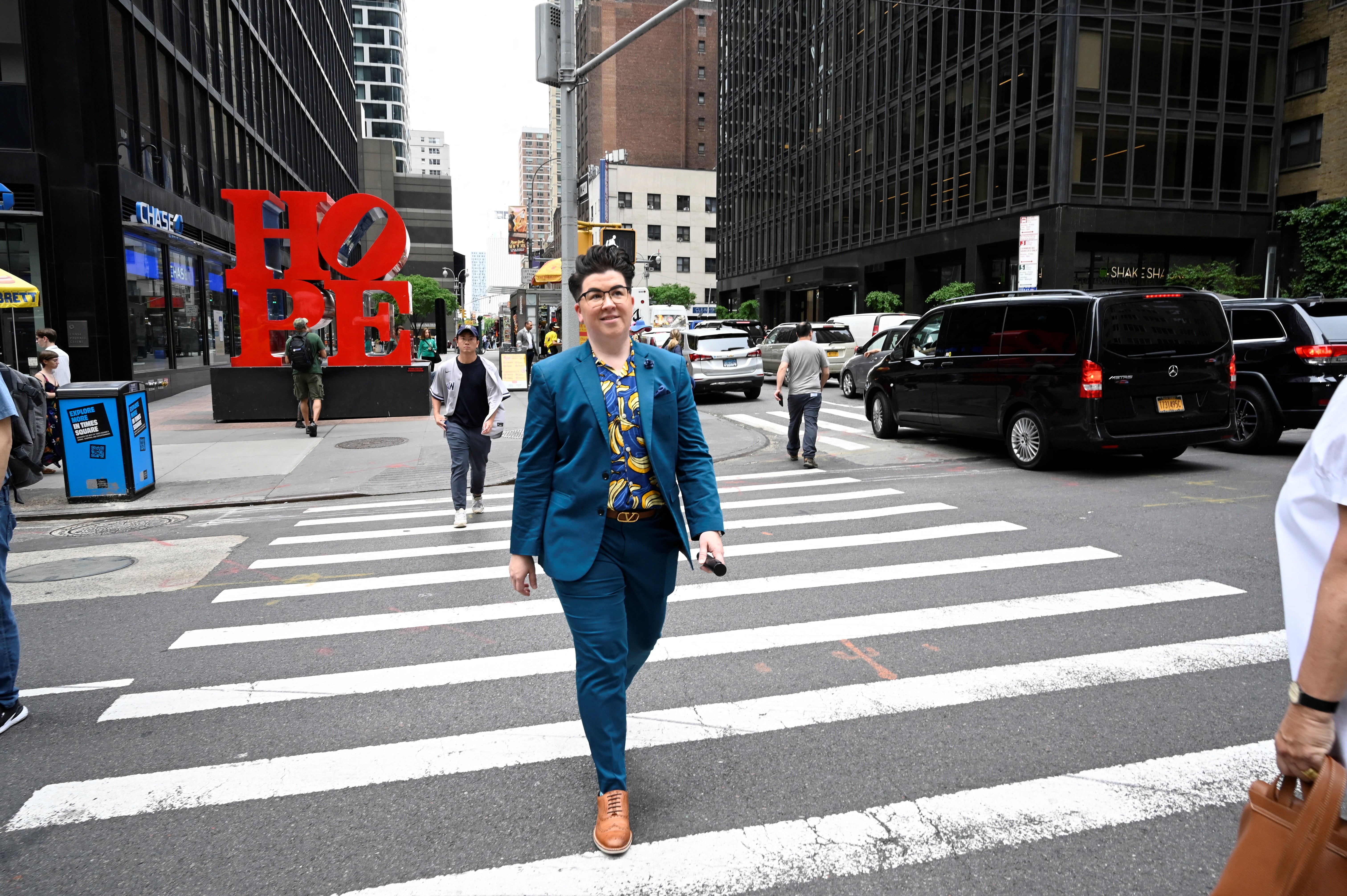 Spehar walks to the GLAAD media awards ceremony for their podcast's nomination, in New York