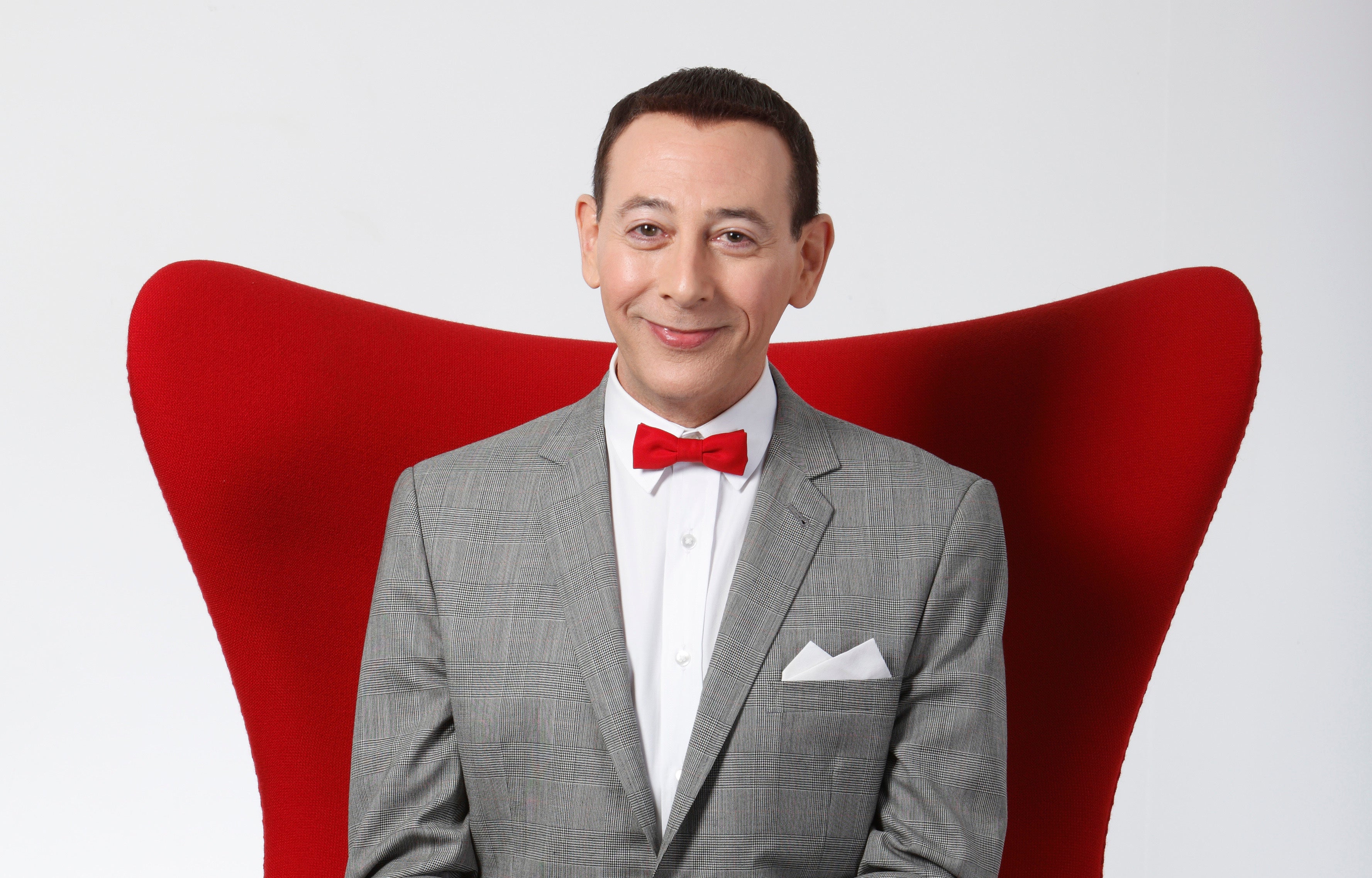 Paul Reubens portrays Pee-wee Herman