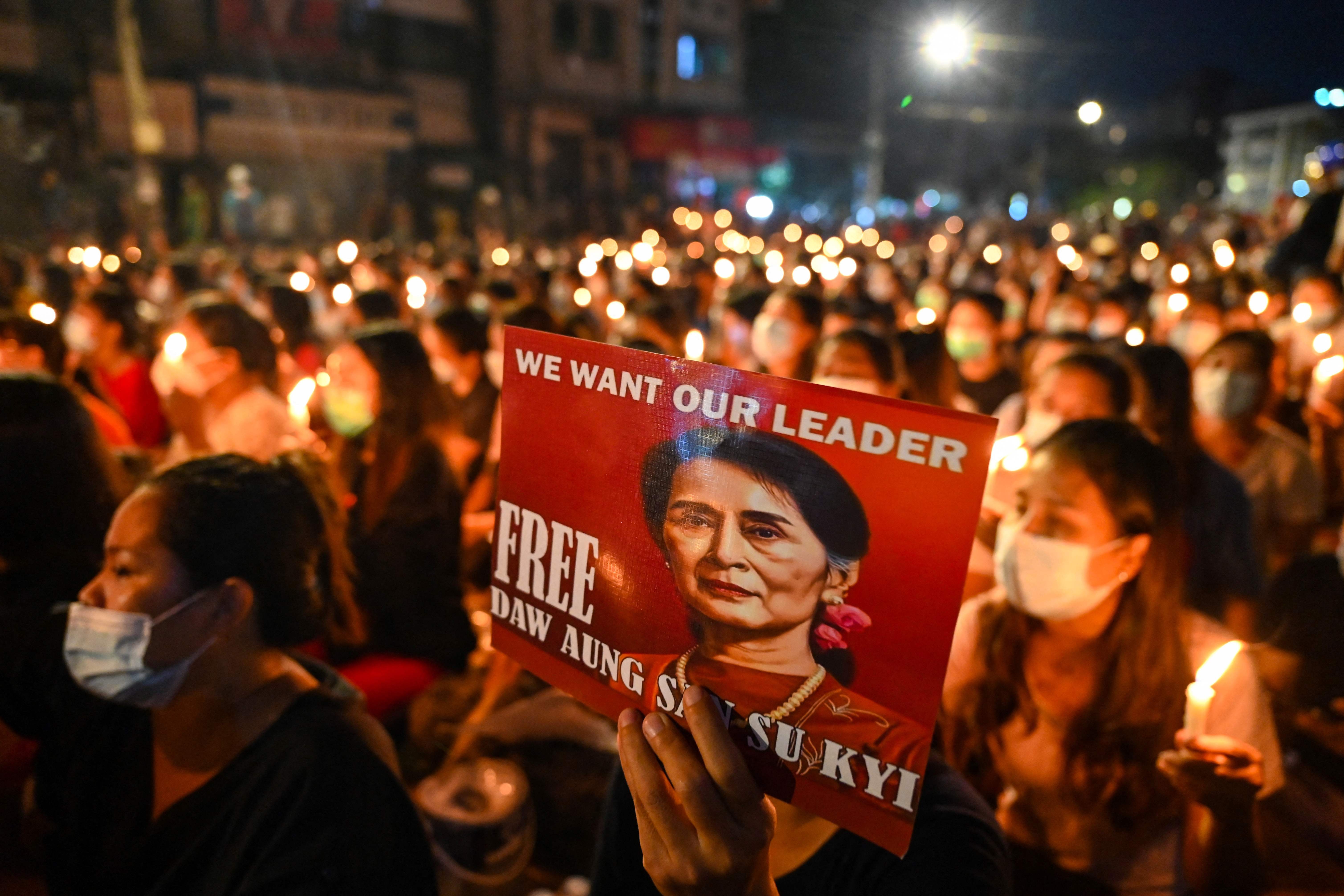 Protesters attend a candlelight vigil to honour those who have died during demonstrations against the military coup in Myanmar