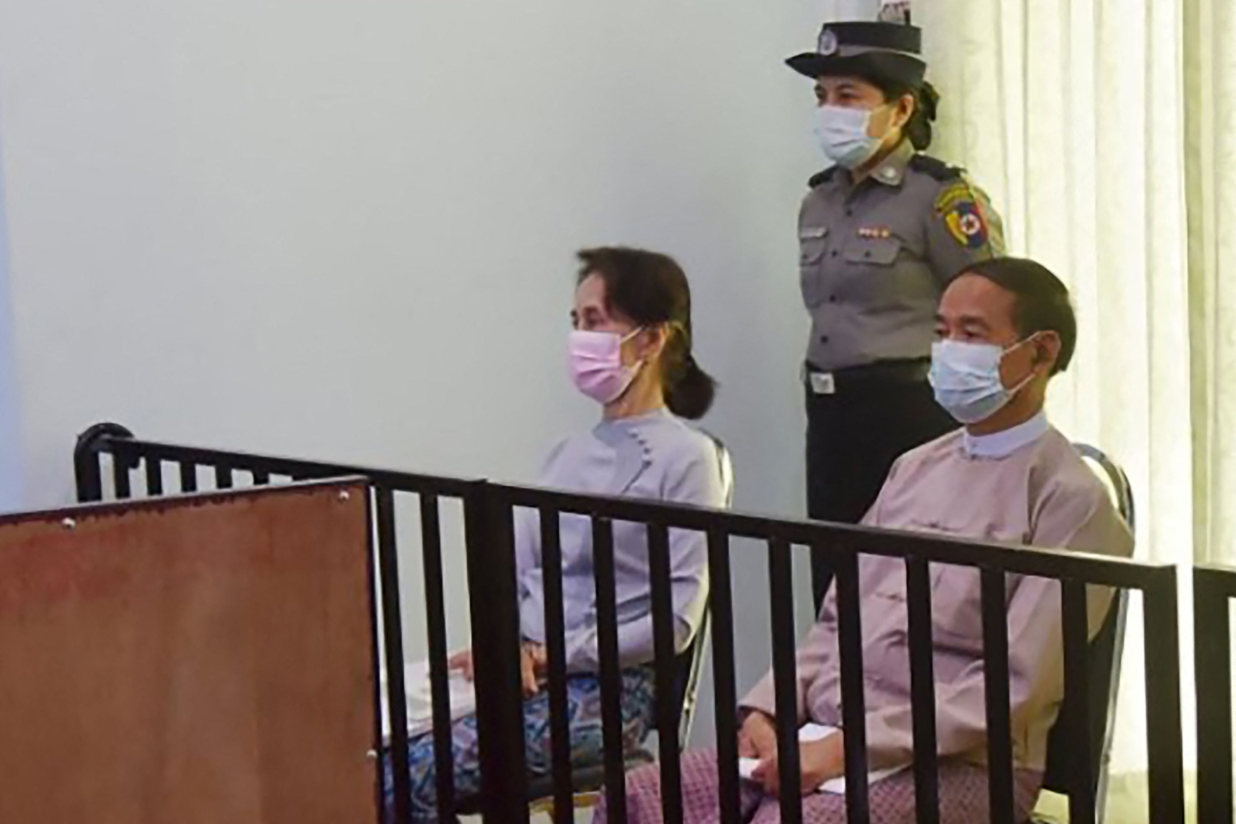 Aung San Suu Kyi and Win Myint during their first court appearance in Naypyidaw, on 24 May 2021