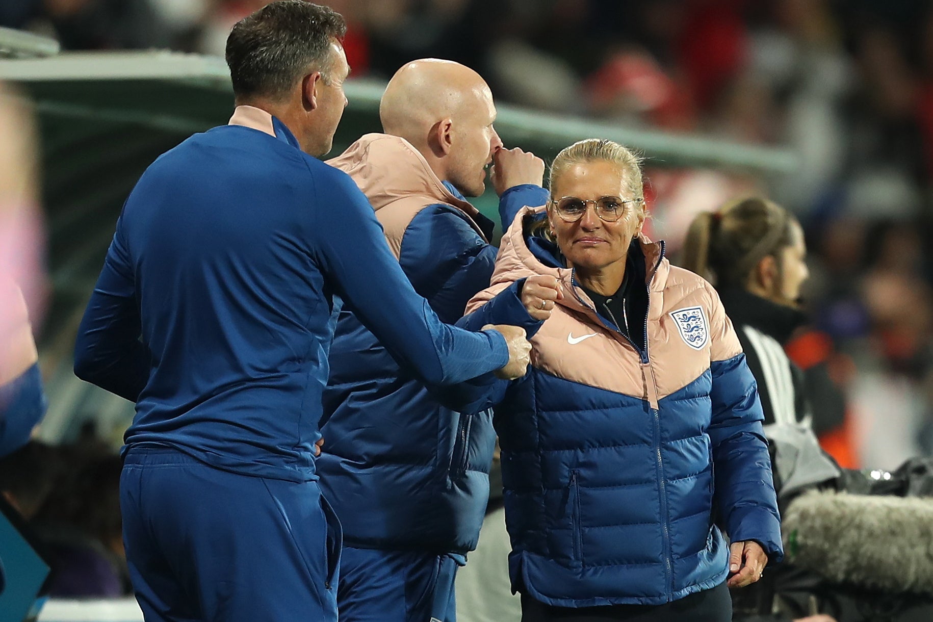 Sarina Wiegman celebrates another England goal with coaching staff