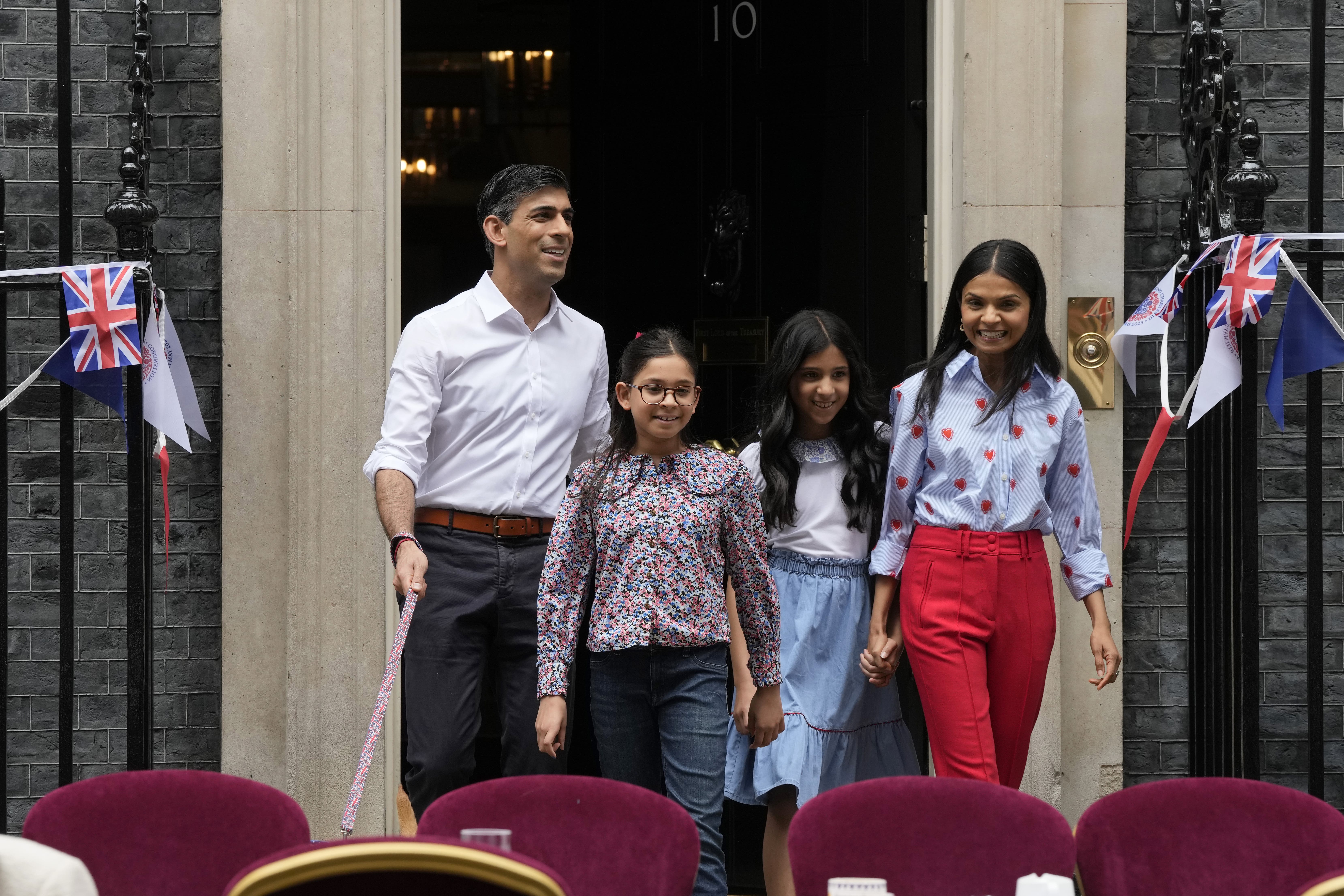 Rishi Sunak, with his wife, Akshata Murty, right, believes he can convince his daughters about his oil and gas plans (Frank Augstein/PA)