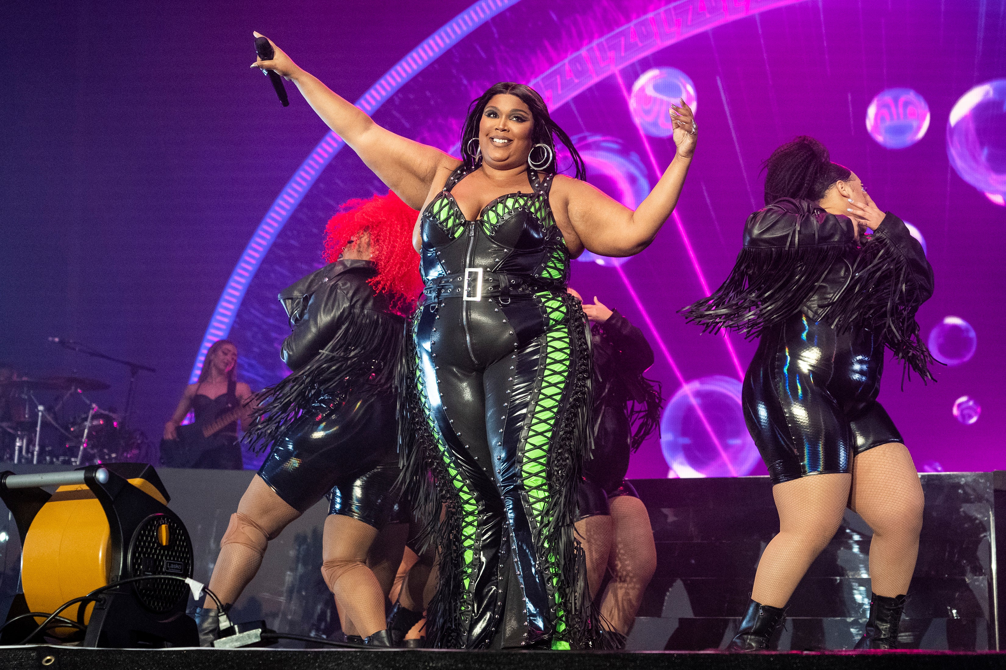 Lizzo on stage with her dancers