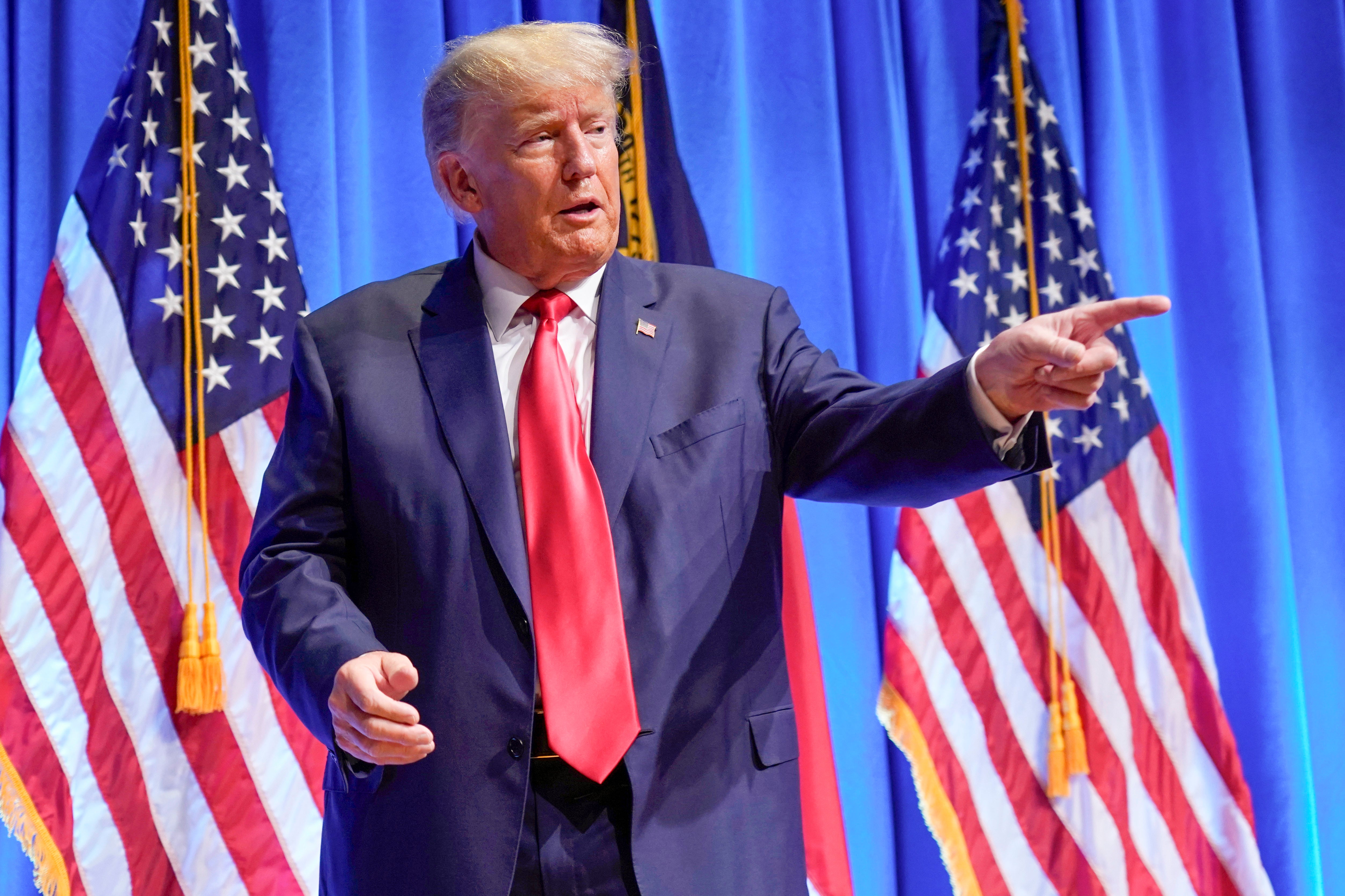 Former President Donald Trump gestures after speaking during the North Carolina Republican Party Convention in June 2023