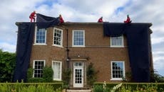 Watch the moment Greenpeace scale Rishi Sunak’s Yorkshire home to stage protest on his roof