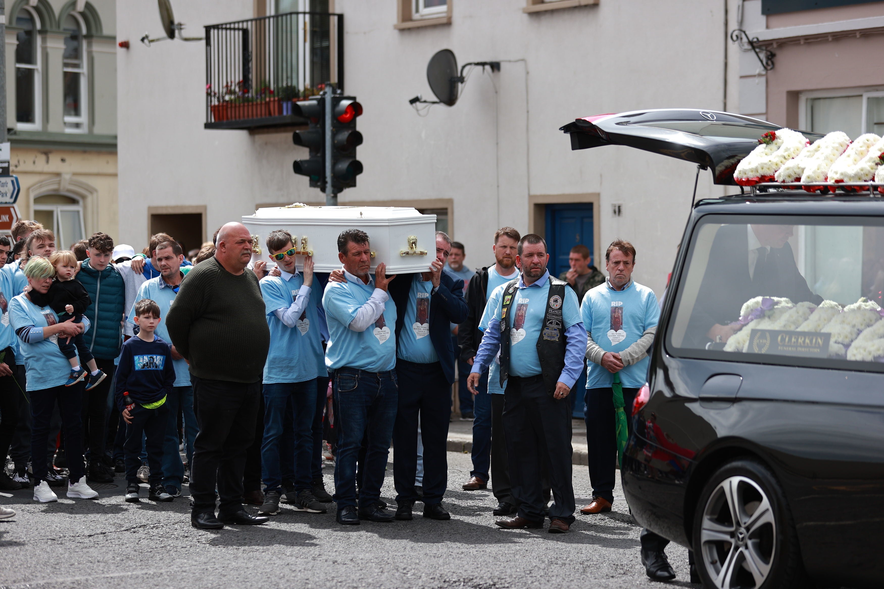 Kiea’s coffin is carried into the Sacred Heart Chapel