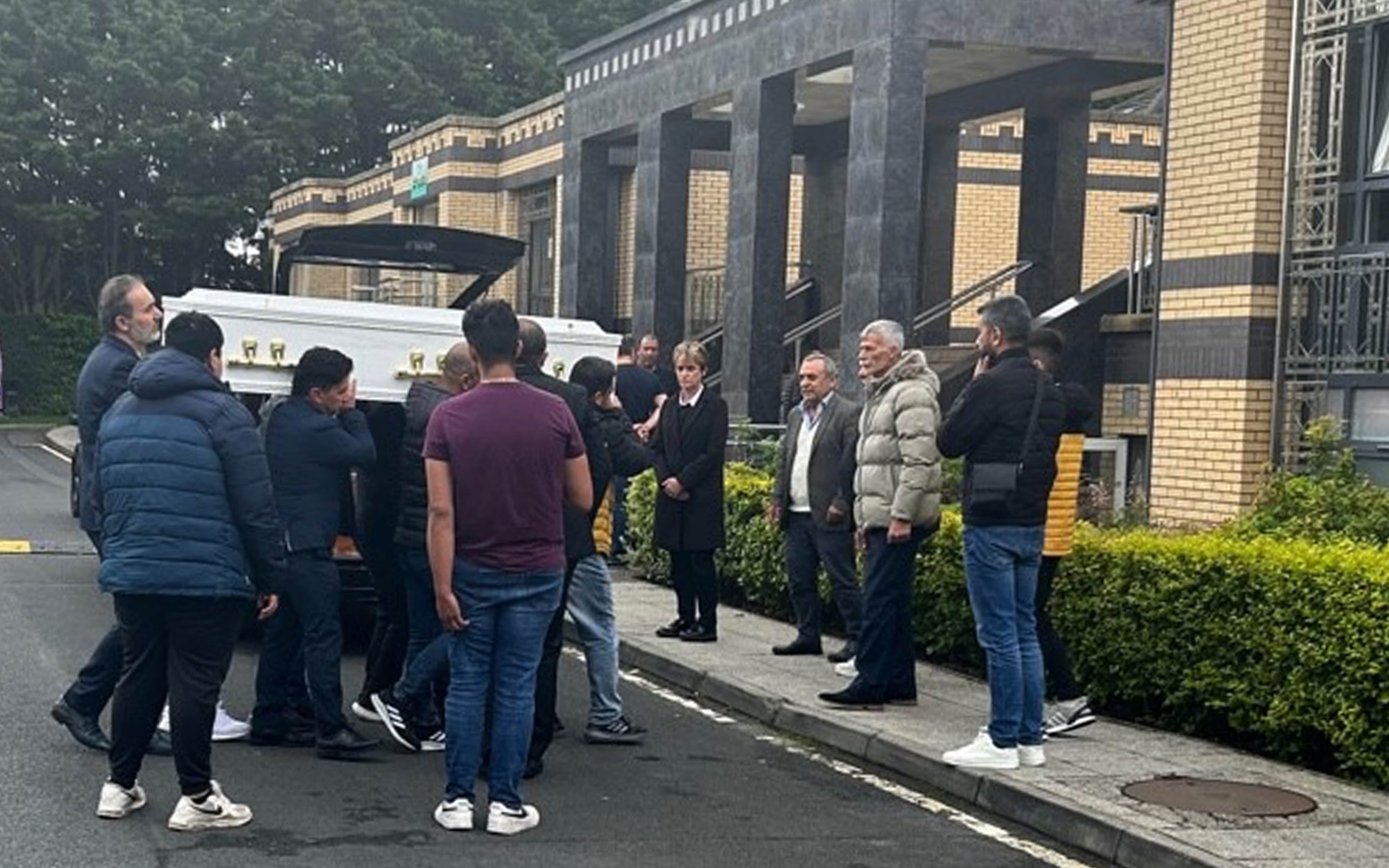 Pallbearers carry Dlava’s coffin into the Islamic Cultural Centre in Dublin