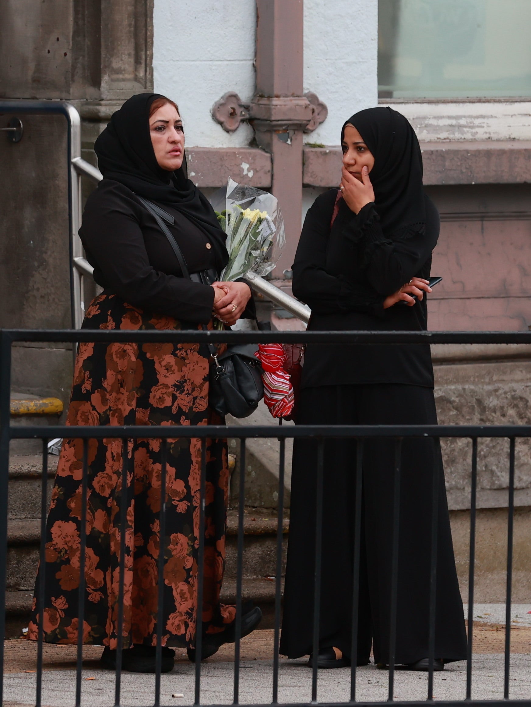 Mourners outside the family home of Dlava ahead of her service in Dublin