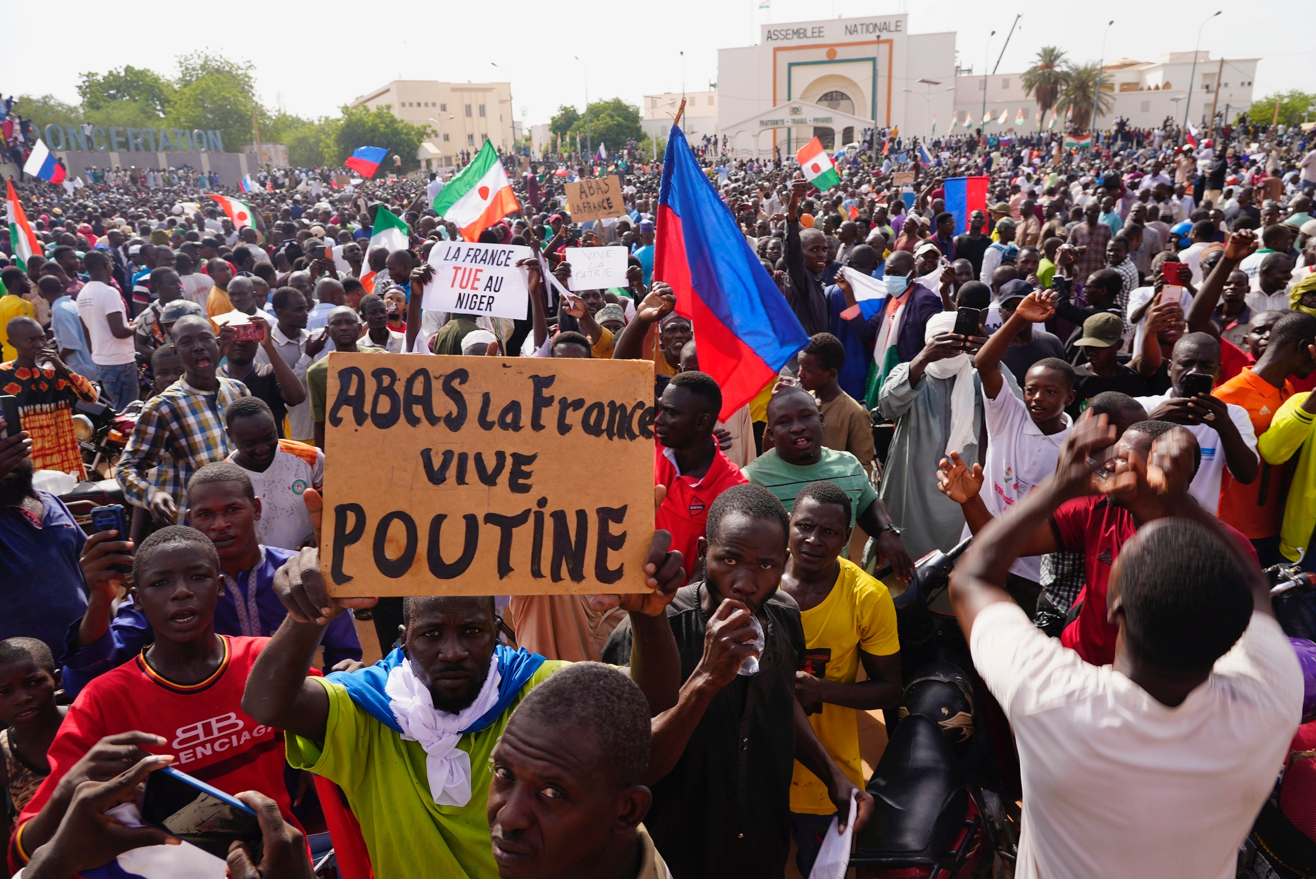 A march called by supporters of the coup in Niger. The sign reads: ‘Down with France, long live Putin’