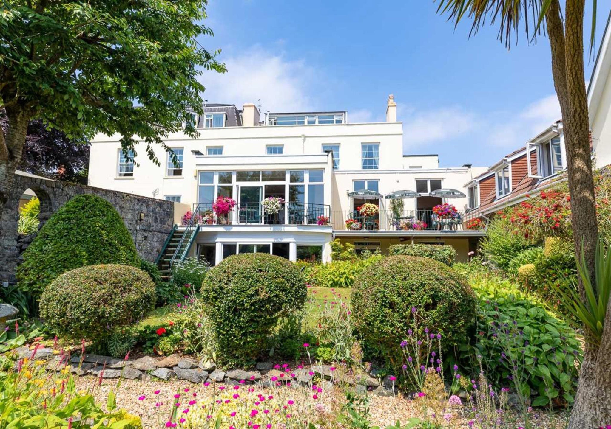 Enjoy lunch with views of the hotel’s garden