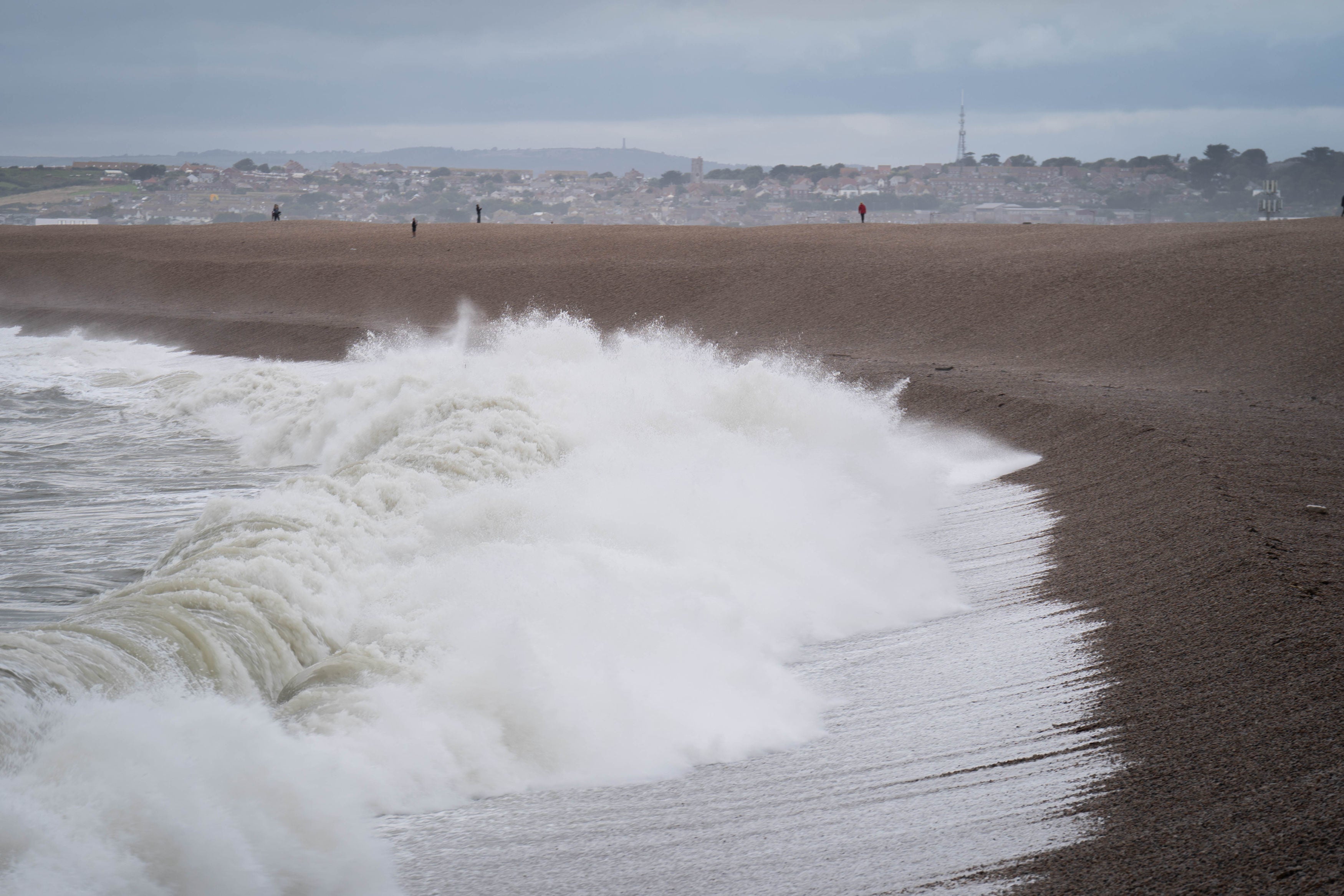 Waves crash against Chiswell Beach in Dorset, Wednesday 2 August