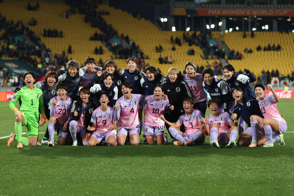 Japan celebrate their 3-1 win over Norway to reach the last eight