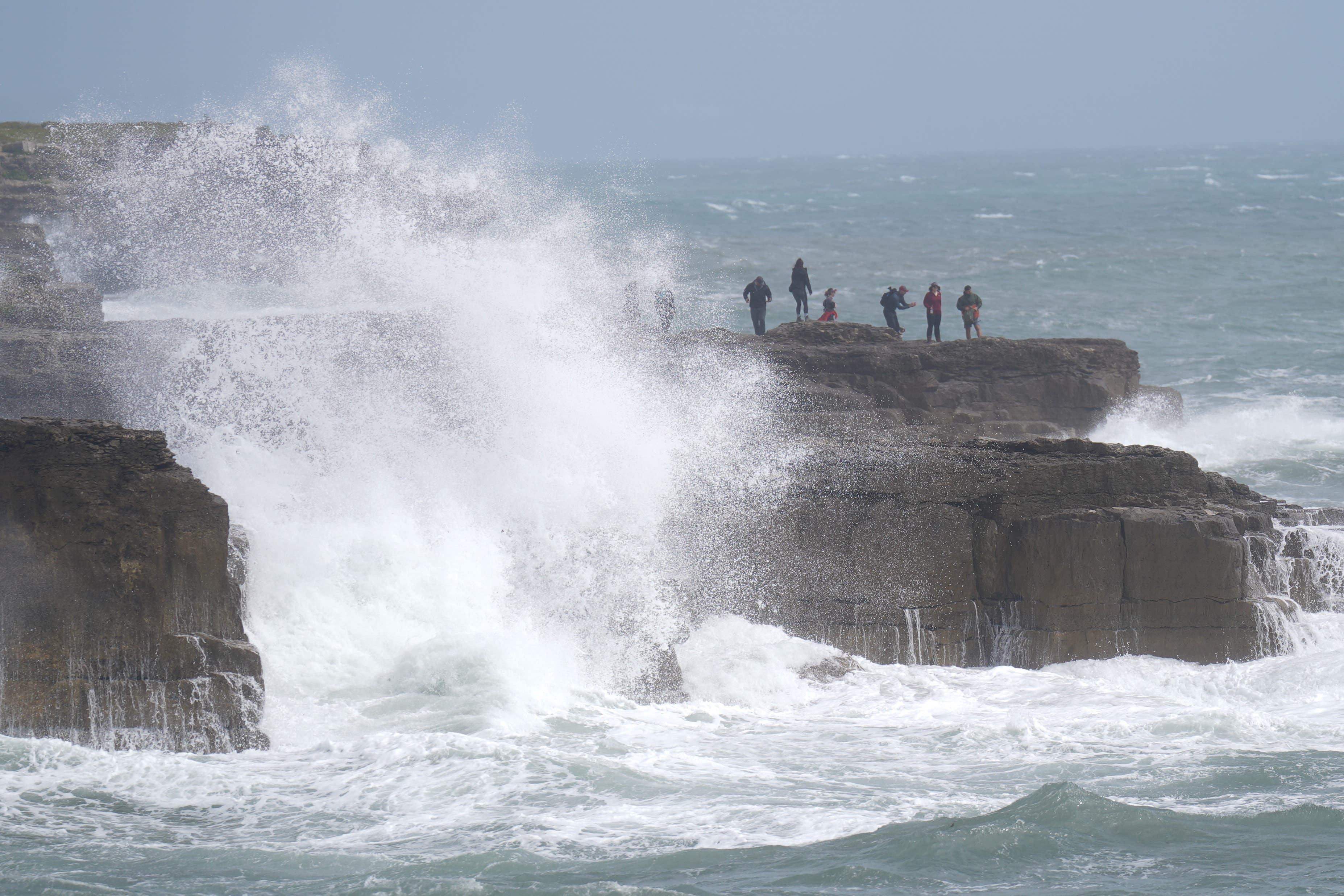 Waves crash against the shore in Portland, Dorset (James Manning/PA)