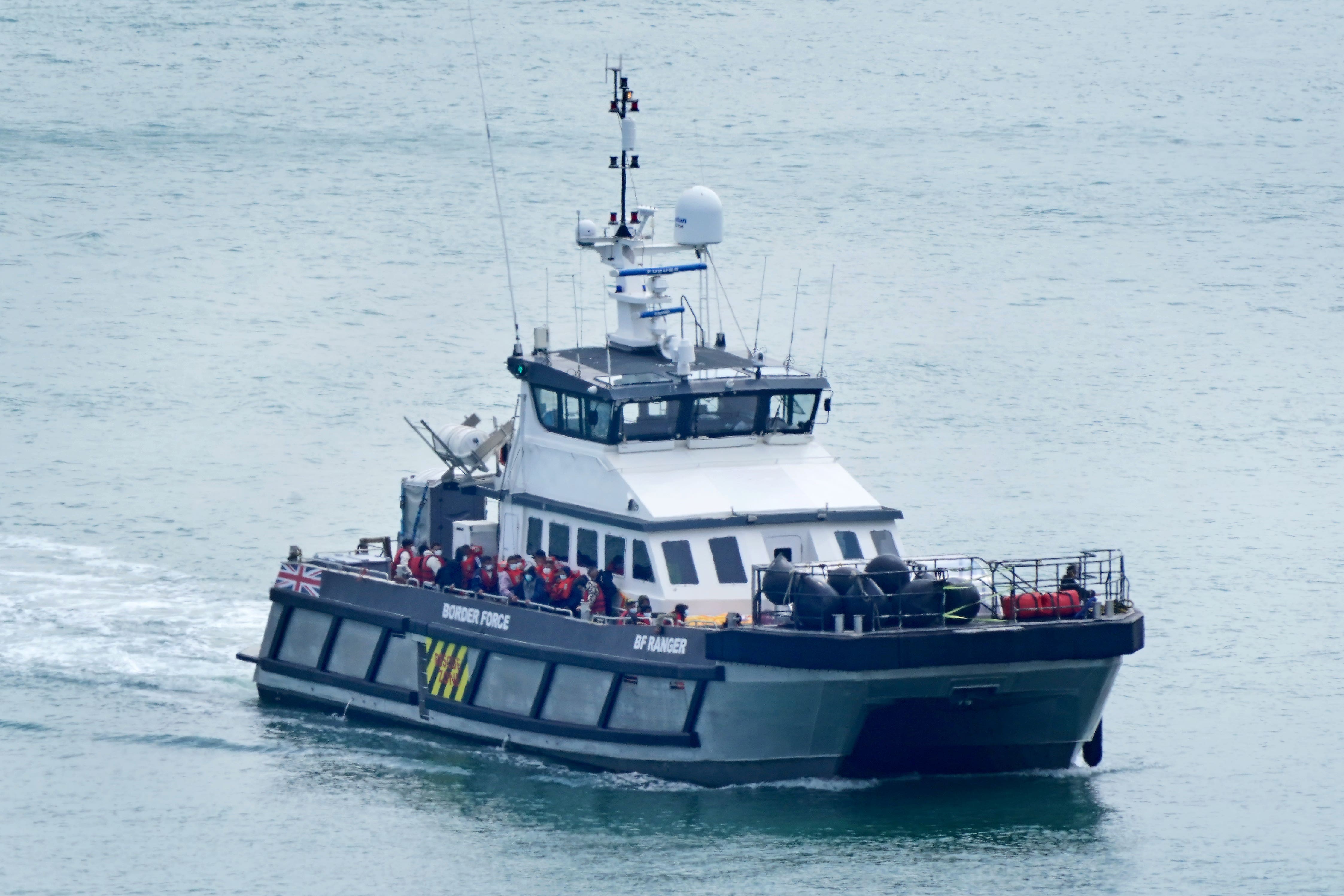 A group of people thought to be migrants are brought in to Dover (Gareth Fuller/PA)