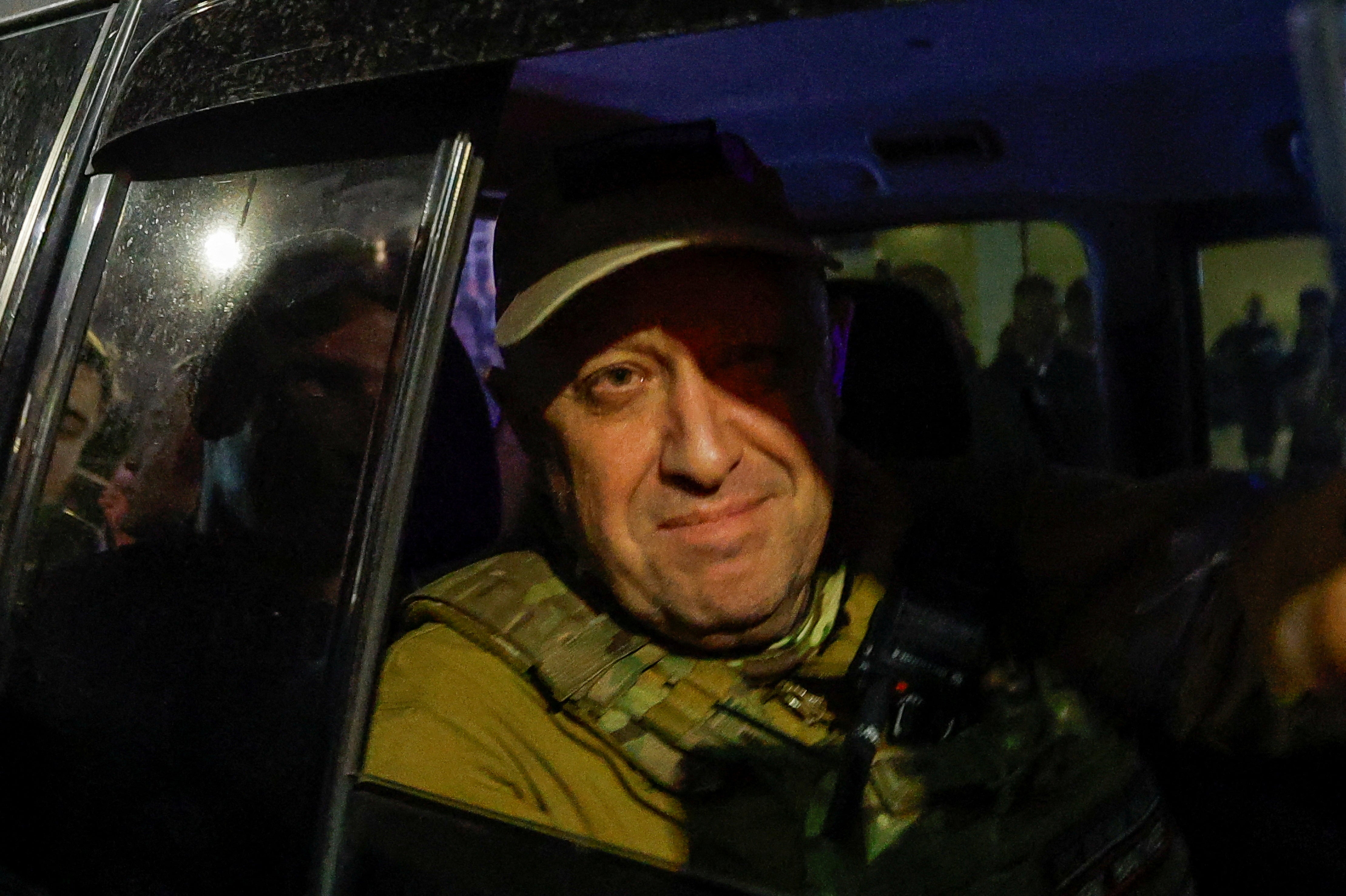 Wagner mercenary chief Yevgeny Prigozhin leaving the headquarters of the Southern Military District amid the group's pullout from the city of Rostov-on-Don