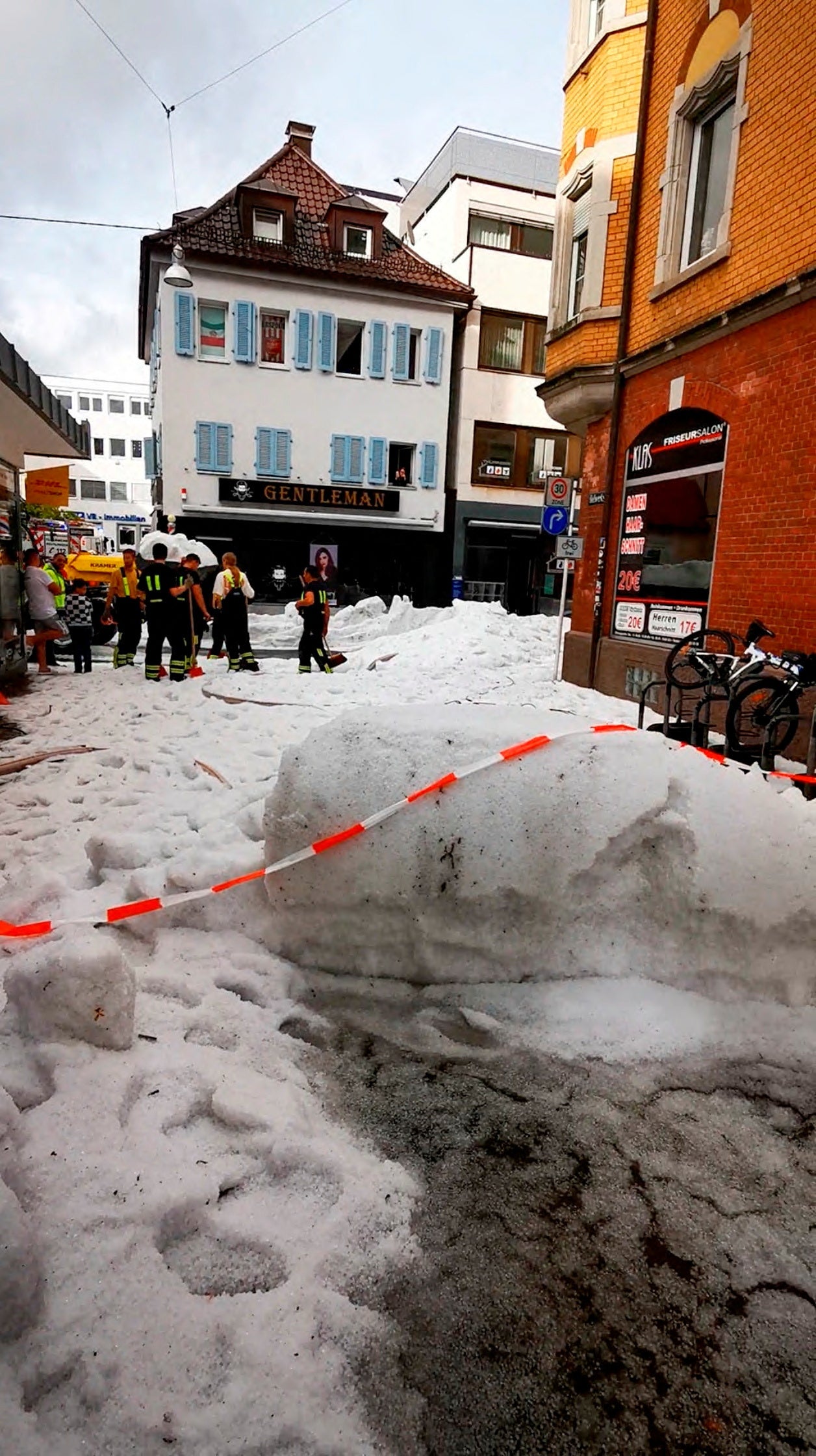 A road is cordened off due to hail in Reutlingen, southern Germany, on August 4, 2023.