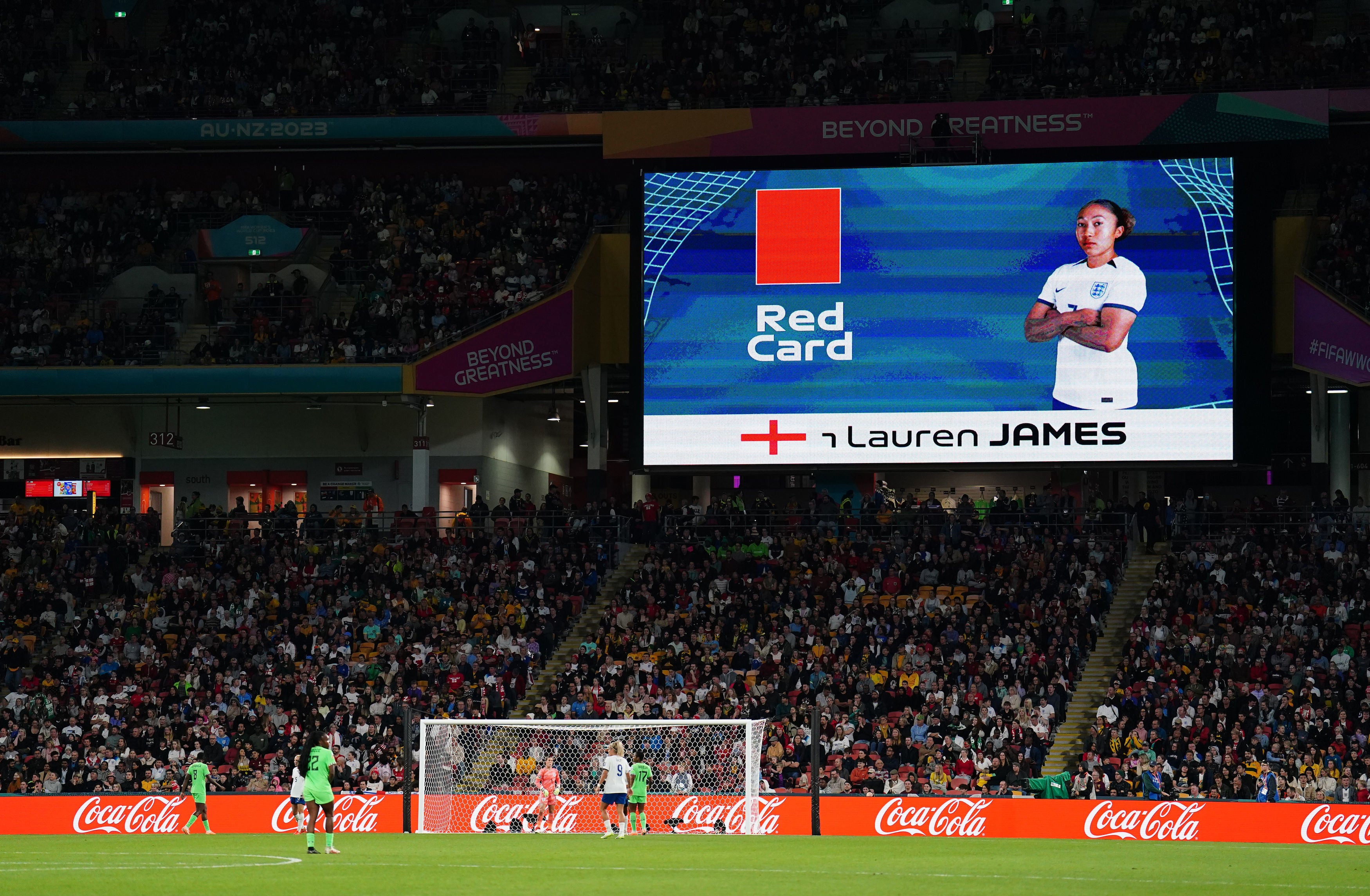 The big screen at the Brisbane Stadium shows a red card for Lauren James