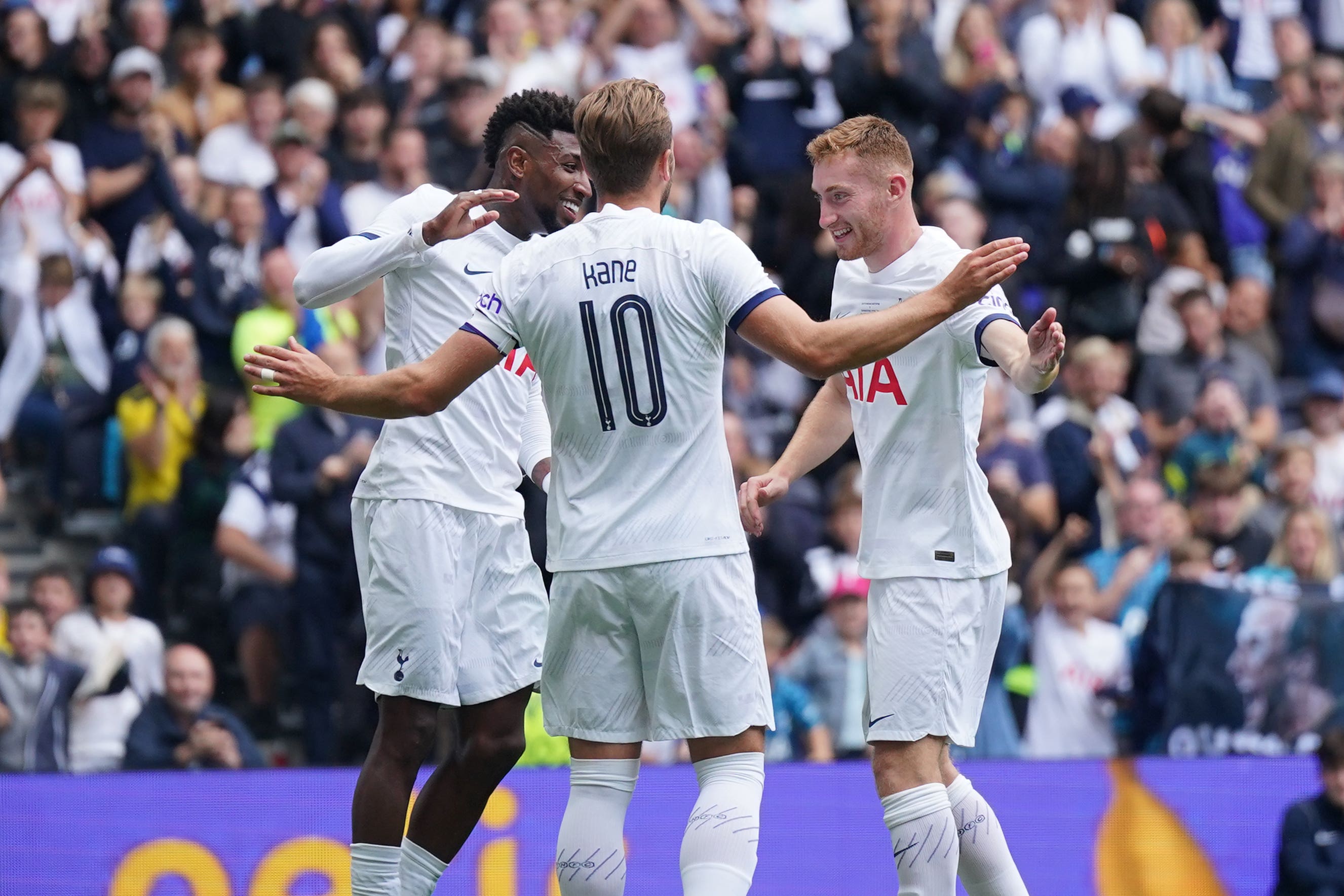 Tottenham Hotspur’s Harry Kane celebrates scoring with Dejan Kulusevski (right) and Emerson Royal (left) (Yui Mok/PA)