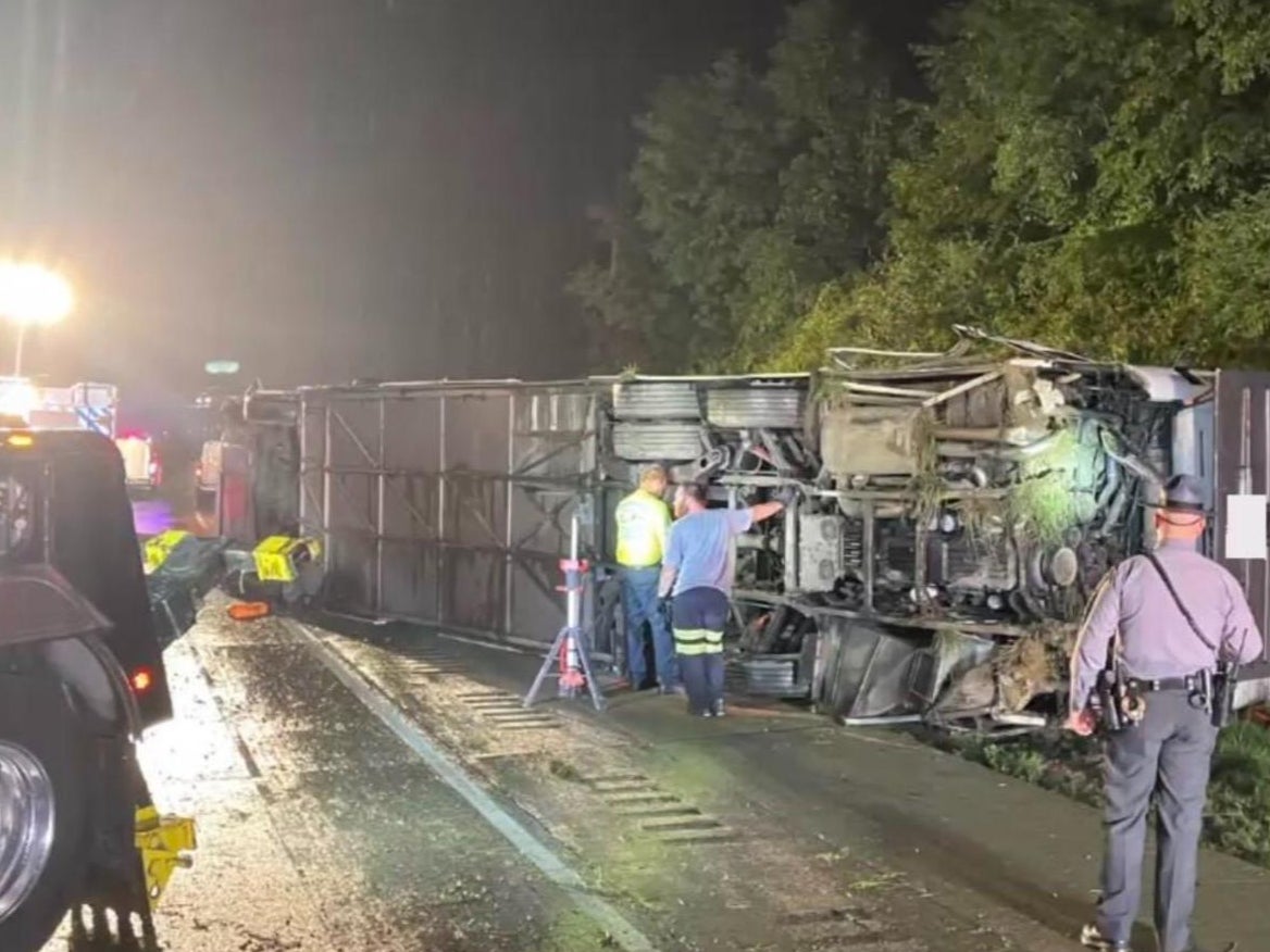 A tour bus on its side on I-81 after it crashed and then flipped in Pennsylvania on Sunday killing at least three people and injuring several others.