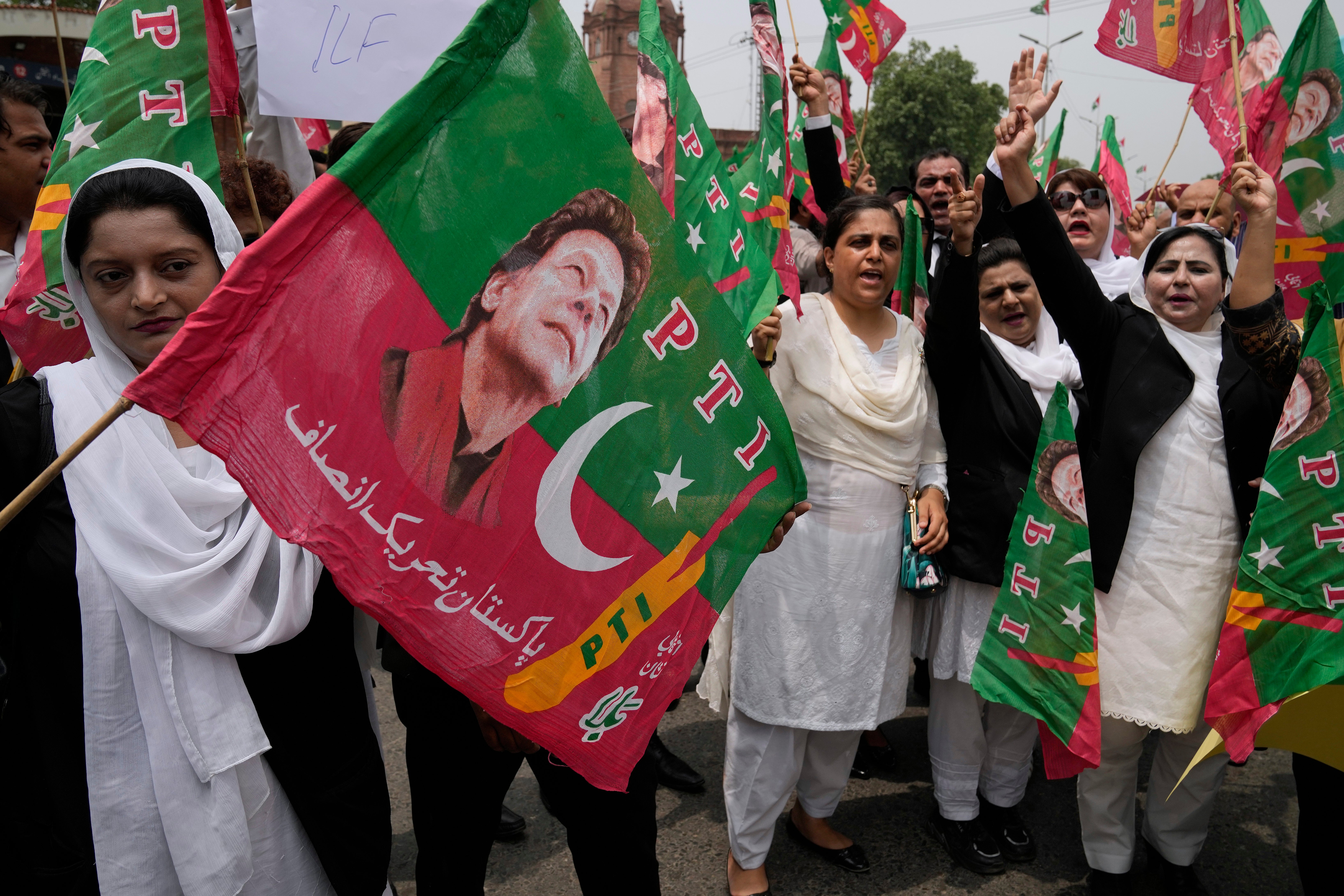 Lawyers who support Pakistan's former prime minister Imran Khan hold a protest against his imprisonment, in Lahore, Pakistan