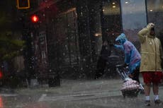 At least two killed, thousands of flights cancelled and 1.1 million without electricity in eastern US storms