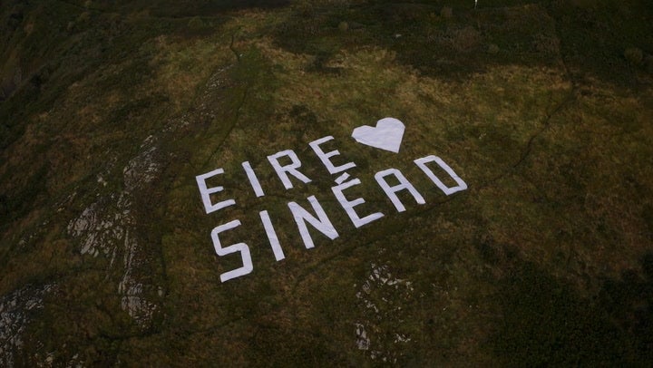 Sinead O’Connor hillside tribute unveiled close to town where singer will be buried