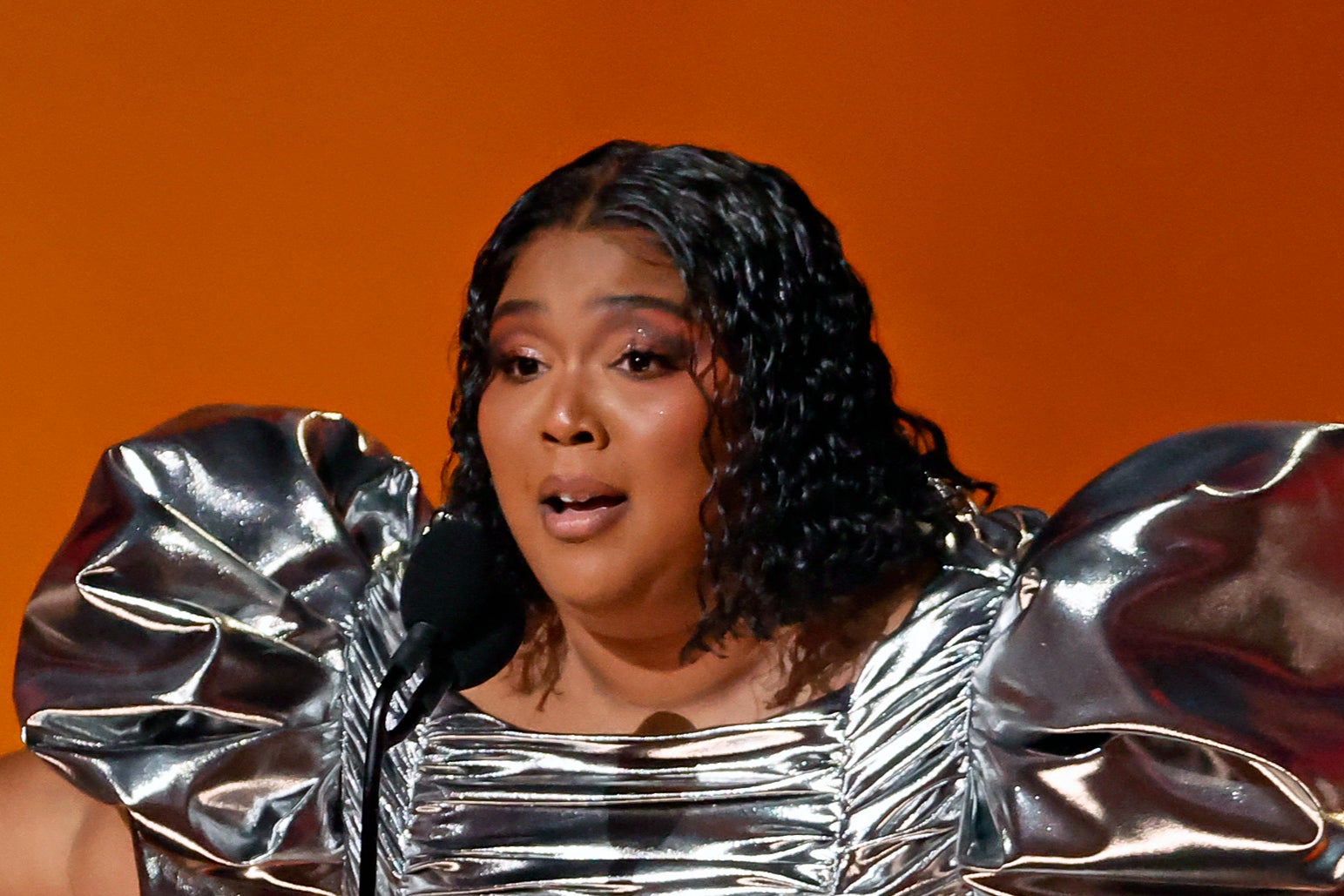 Lizzo accepting the Record Of The Year award for ‘About Damn Time’ at the Grammy Awards earlier this year